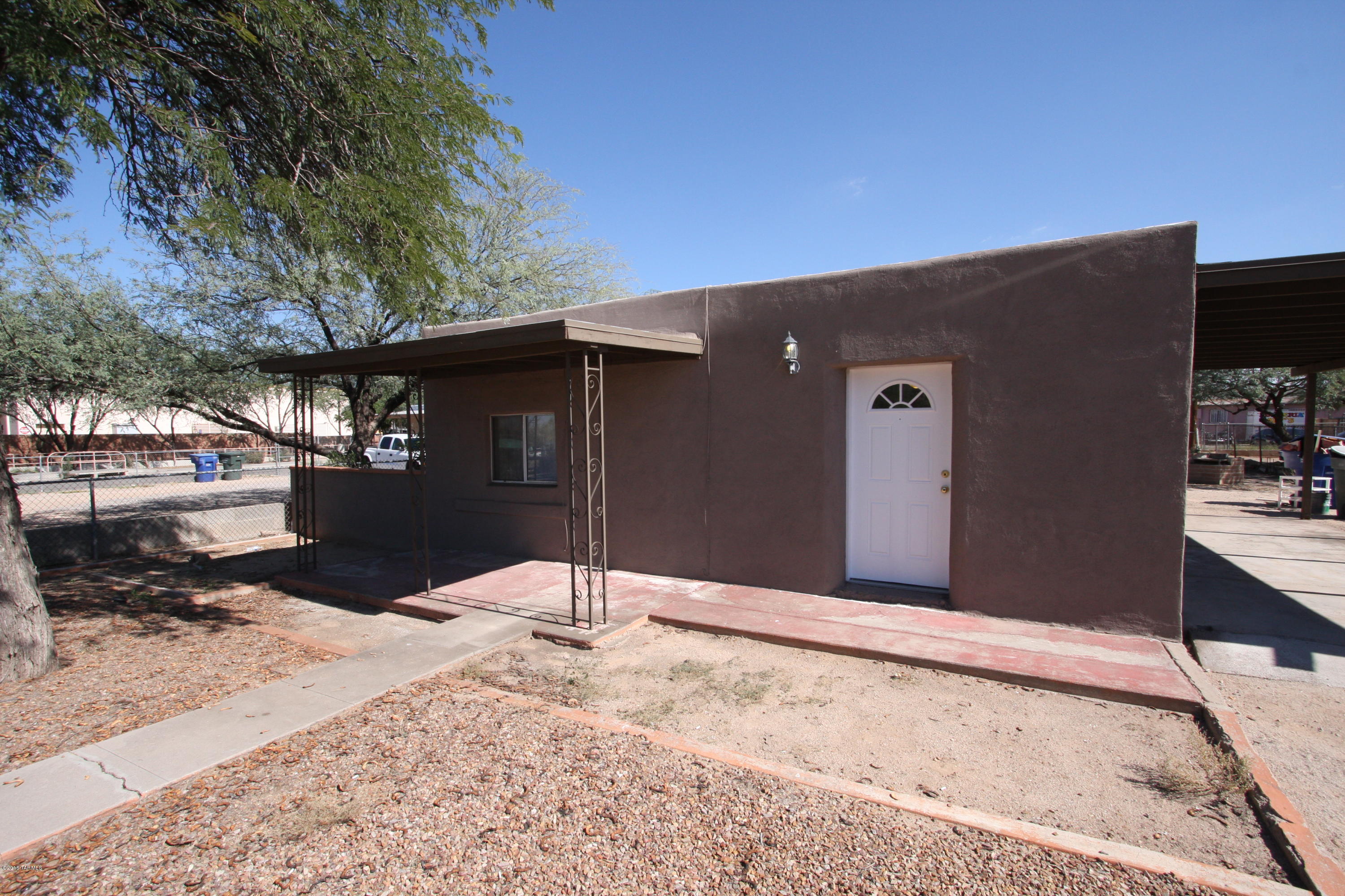 Conveniently located near I-10 & I-19, this two bedroom remodeled home sits on a large fenced lot. Washer and Dryer included!