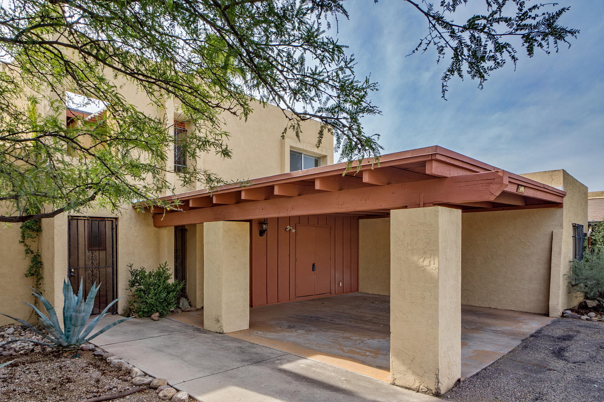 This spacious two story townhome is an amazing value for someone w that special decorative eye. The home has a BRAND NEW ROOF and fresh paint in 2016. Bring your savvy kitchen & bathroom remodeling ideas and turn this in to the perfect seasonal or year round home. Convenient to Sabino Canyon, River Walk, Udall Park & more! Located in a sweet little neighborhood with desert landscaping and a community pool! The versatile floor plan offers two living areas downstairs, kitchen, dining, laundry, two patios and a half bath on the first floor and three over sized bedrooms, 2 bathrooms and a balcony off the master on the second floor. Beautiful mountain views from the master make it a perfect retreat.  AC about 5 years old.