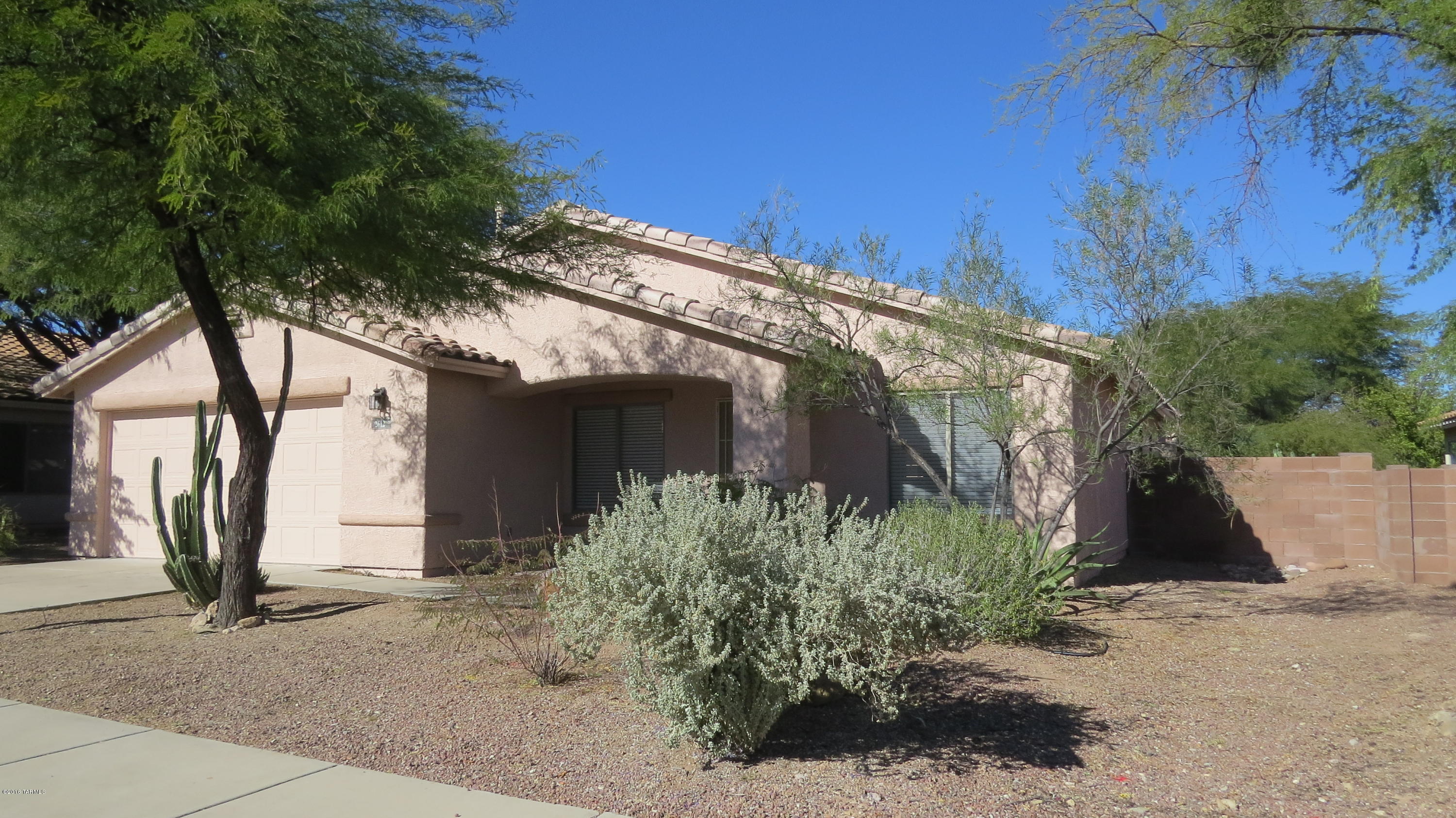 Gorgeous Home close to Downtown and Pima CC West Campus. Nicely updated with new interior/exterior painting, concrete floors in main living areas and wood laminate in the bedrooms. Kitchen features SS appliances, lots of cabinets, concrete counters, Breakfast Bar Island, Dining area and Great Room feel with spacious Family Room. Gorgeous Master Bedroom w/Bay Window, Huge Walk In Closet and Master Bath with Garden Tub/Shower and extended dual vanity. Spacious Secondary Bedrooms and 4th Bedroom with double French Doors could also make a great Home Office. All appliances included, nice Laundry Room with Washer/Dryer, Oversized 2 Car Garage, new Window Coverings, nicely landscaped yard and be ready to move right in! Great Down Payment Assistance Programs for Qualified Buyers.