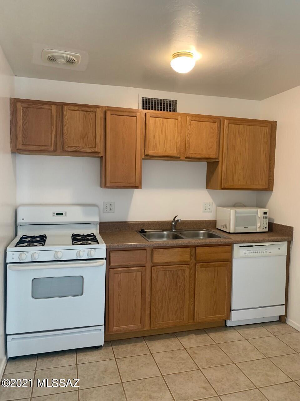 Sunset Foothills Condos (1-201) - Residential Lease