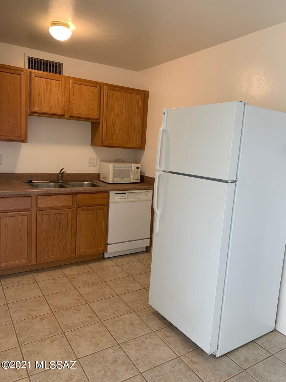 Sunset Foothills Condos (1-201) - Residential Lease