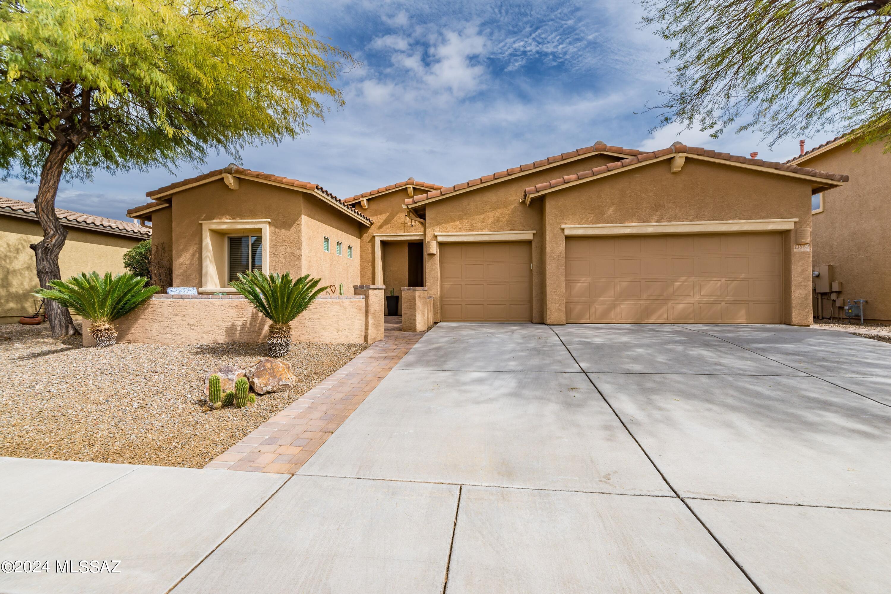 Owner/Agent listing. 
This Beautiful, updated home rests in the heart of Oro Valley with close proximity to restaurants, stores, and parks.  Enjoy your private backyard with beautiful panoramic views of the Catalina Mountains, heated pool & spa, waterfall, pergola, and travertine paved outdoor entertaining area.  This home boasts an open concept family room with a gorgeous updated kitchen, picture windows, granite countertops, large island and plenty of storage. The bedrooms are spacious and bright.  High ceilings, update design and finishes and open concept make this home the perfect turn-key. Visit us today.

This gem of a home, in this area, at this price, with this view... won't last long!