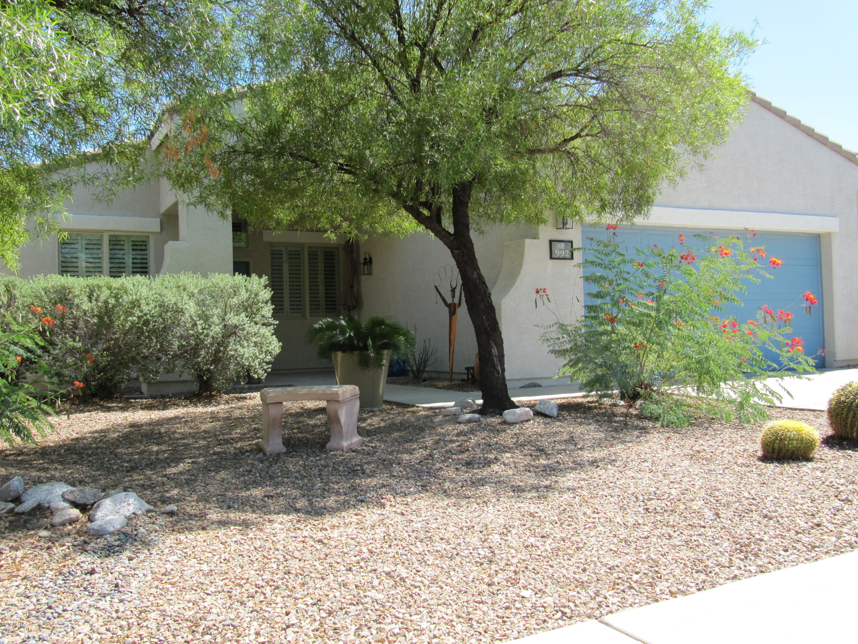Beautiful 4BR (or 3BR & an Office!) in sought after Harrison Del Sol! Spacious & flowing front formal areas w/vaulted ceilings! Great Room/Kitchen features maple cabinets, Stainless Steel appliances, gas stove, bay window nook, breakfast bar & huge family room. Earth tone tile thruout entire home & custom paint. Split bedroom plan! Office has double doors & closet & could easily be a 4th BDR. Plantation shutters on front windows w/blinds on other windows. Ceiling fans thruout. Master features a bay window, walk-in closet, dual vanities, separate shower & garden tub. East facing backyard has covered patio w/ceiling fan & sparkling pool ! Finished garage w/extra shelving. Call Agent for full photo shoot! 520-331-1337. Application & credit report ($50 each) required. No showings until 10/6!