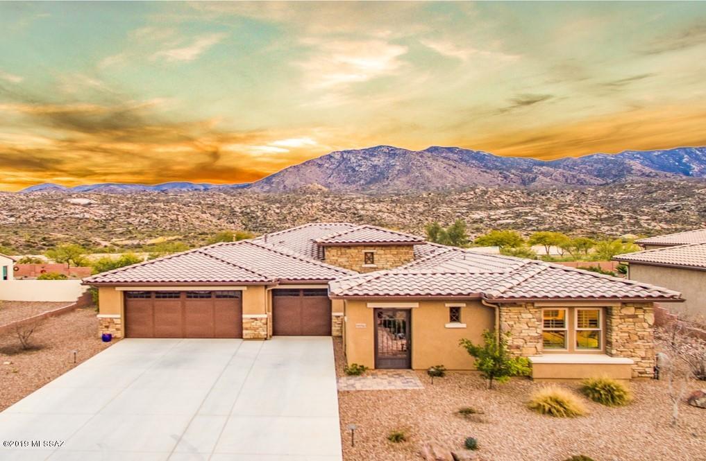 The View Everyone is Looking For.  Adjacent to The Preserve Golf Hole #16 with
Panoramic Catalina Mountain Views.  Gracious 2016 Paloma Home with 22 Owned Solar Panels for Whole House Electric.
As you Enter the Front Courtyard the Double Entry French Doors of 325 sq. ft. Self Contained Casita is to Your Right. Tranquil Fountain Near Custom Front Door Welcomes You Home. Entering this Serene Space Offers Neutral Colors Easy to Decorate with Your Personal Furnishings. Kitchen has 42'' Alder Cabinets, Gas Range, Great Center Island, Spacious Quartz Counters, Stainless Appliances & Nearby Butlers Pantry with Large Walk In Closet.  Great Room, Kitchen and Dining Offer Open Concept Entertaining Space. Walk Right Out Large Patio Doors to
The SaddleBrooke Lifestyle in Your Own Backyard.