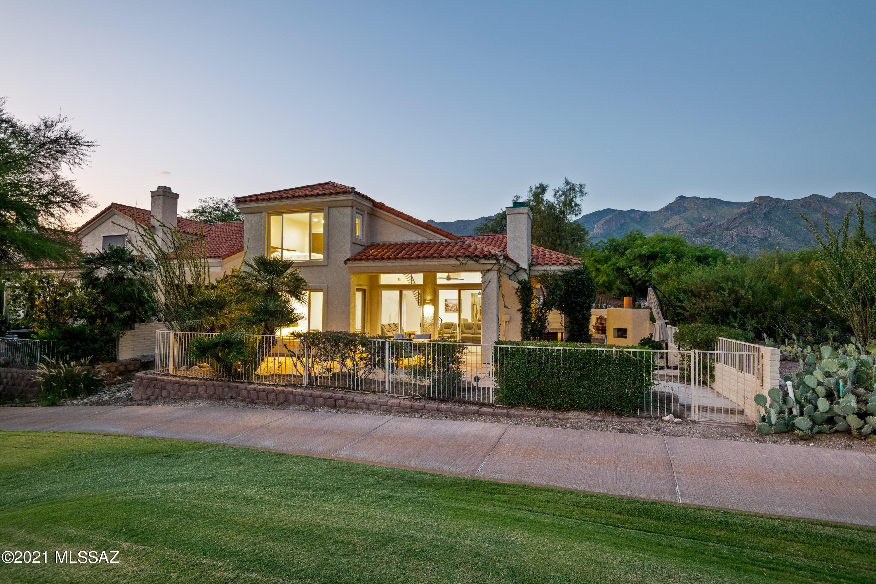 Masterly crafted elegance and luxury in this Contemporary ''Smart'' Home. North/South facing , ON THE GREEN of Ridge #2 on the Ridge Course at La Paloma. An Abundance combination of both City & Mountain views.  The seller spared no expense with this astounding  3BR (Primary is downstairs) 3BA (2-1) Remodel . Reconfiguring walls, doorways, bathroom, and stairwell to obtain an open floorplan. New enlarged dual pane windows Capturing the magnificent views. This Smart home has everything -surround sound system, Hunter Douglas smart shades, Smart Refrigerator, Smart HVAC, wired for Smart Security system. Alder doors, wood flooring, custom fixtures, cabinetry. All original plumbing replaced -In ground spa, multiple patio's. The Seller has done all the work! This gorgeous home is move in Ready!