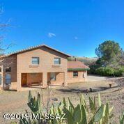 A charming 3/BR 3/BA + Office/Den Two story custom built home.  Featuring spacious living areas. Kitchen displays a beautiful tile back splash. Oak colored cabinetry with plenty of counter spaces. A wood and wrought iron stair way leading up to the second floor.  Beautiful tile throughout the home, expect the bedrooms,
Master suite is complete with a large tub and separate shower. The secondary bedrooms are generous in size..  This well maintained home sits on a 0.48 acres, plenty of backyard spaces.
