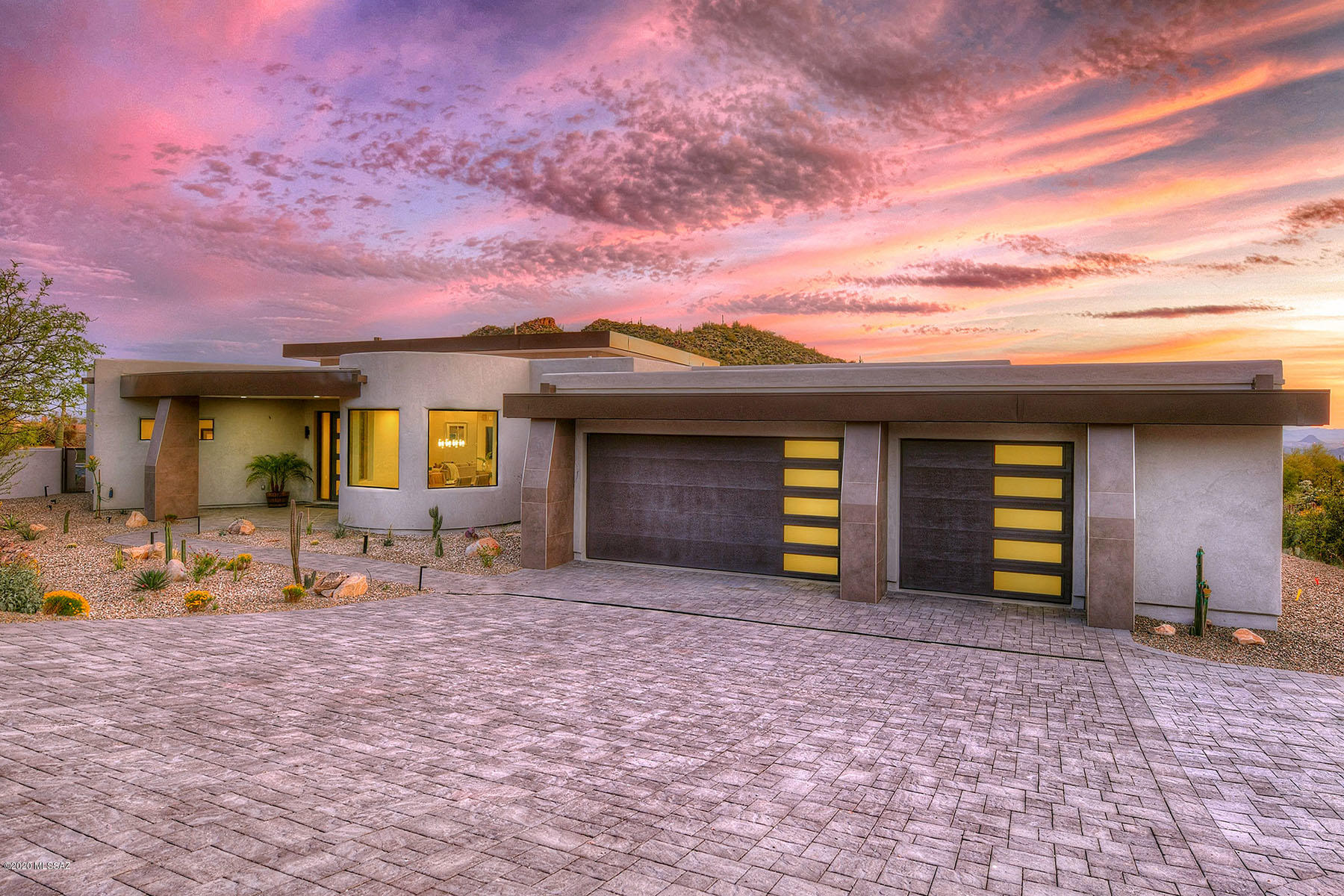 BRAND NEW one of a kind contemporary custom home overlooking the 4th fairway/green at the Gallery North Course! Located inside guard gated Canyon Pass and second gate of the exclusive 20 estate homesites of the Vaquero enclave! 4BR/4.5BA + Office/Study. Top-quality high-end amenities throughout every room. Gourmet kitchen w/ waterfall quartz countertops, 60'' Wolf SS double oven freestanding range, 48'' Subzero refrigerator, & wine refrigerator. Easy living lifestyle w/ no steps or carpet! Breathtaking mountain and valley views from every window. Master Suite features fireplace, w/ huge walk-in closet w/ built ins. Oversized 3.5 car garage w/ storage. Don't miss out on the NEWEST and FINEST home Dove Mountain has to offer! Be the first to live in this brand new luxury home. Check out the 3D Tour under Photos/Virtual Tour and view the full Floor Plan under Documents.