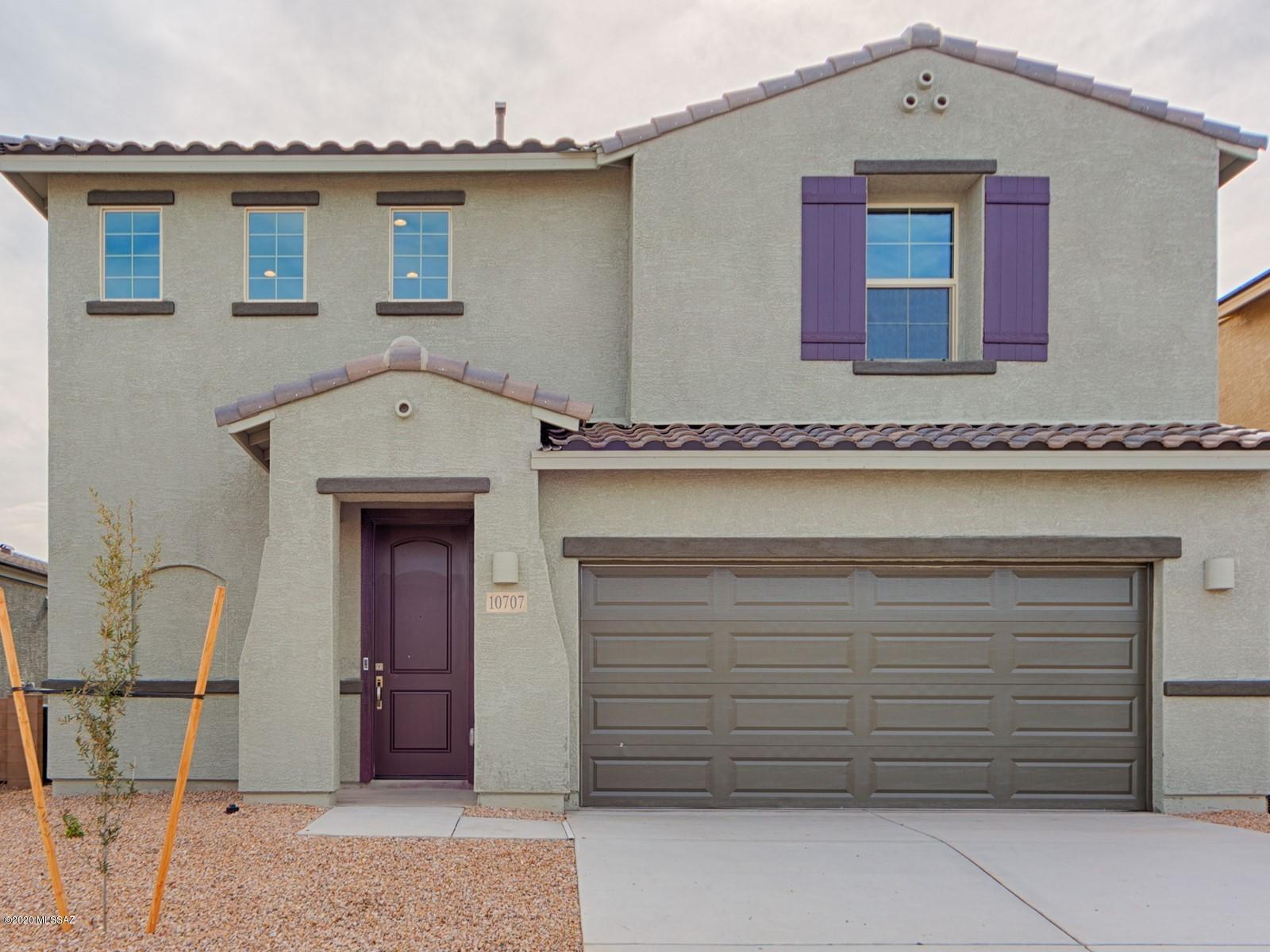 Brand NEW energy-efficient home ready NOW! Slate plan features gorgeous foyer, open to the second floor. The covered patio offers plenty of space for outdoor living and a tranquil master suite. Premier Package - 42'' Sonoma Maple Linen cabinets, Ludlow Tan Quartz countertops, Verona Hills carpet in bedrooms only and 8x24 Udo Osaka tile. 3X6 white staggered kitchen backsplash, Laundry white base & upper cabinets with utility sink, ceiling fan pre wired at all livable locations, Trans Globe Mesh brushed nickel dining/nook light and 2 trans globe pendants, undermount sink, Dover white interior paint and Phone/TV outlets in all liveable rooms. Garage door openers, ceiling fan prewire at rear patio. Enjoy access to recreation for everyone, with splash pad, sport courts and fields, walking paths and neighborhood parks. Located in the highly sought after Marana Unified School District. Known for their energy-efficient features, our homes help you live a healthier and quieter lifestyle while saving you thousands on your utility bills.