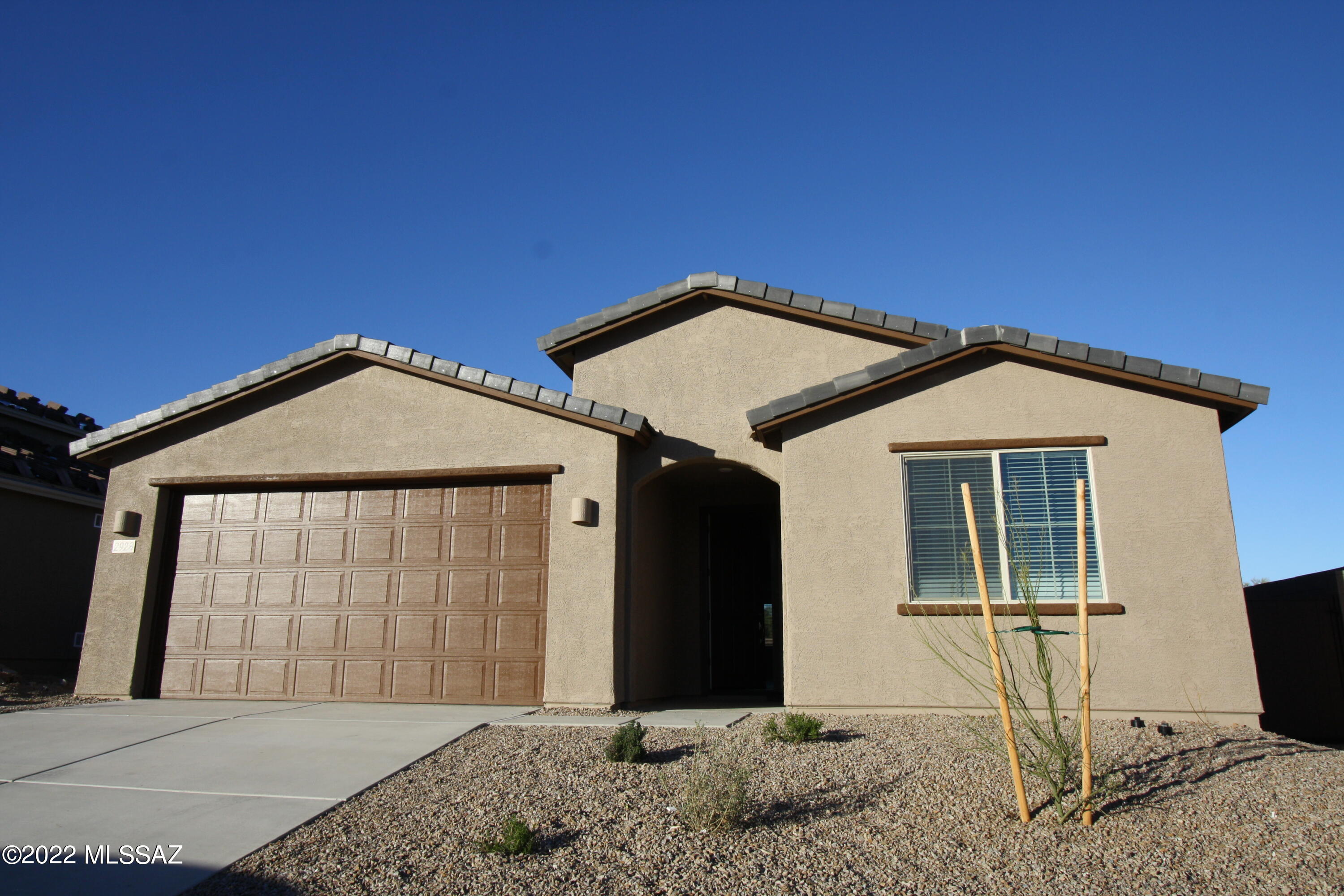 Newer 3bdr/2ba w/Den Lennar Home is Mountain Ridge Vista Community! Stunning home w/loads of upgrades including, tiled wood-look flooring, LED can lighting throughout, Granite counters, stainless steel appliances, walk-in pantry, gas stove, 2 ovens, ceiling fans, and more! This Brand new SMART home offers a Ring system remote control! Primary features a walk-in closet, tiled walk in glass shower, dual vanity, linen closet, and more! Split bedroom floorplan, hall bath has dual vanity and separate shower/tub area. Three car tandem garage.
