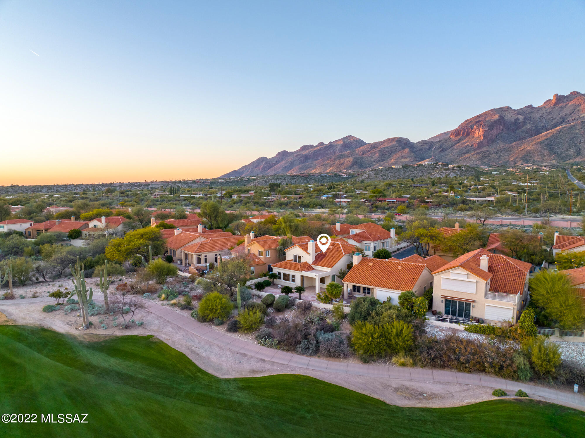 Masterfully crafted elegance and luxury is what you will find in this contemporary two story home located in the coveted La Paloma Vista neighborhood. The primary suite overlooks the golf course, and has spectacular unobstructed city and mountain views where you can relax on your private terrace and watch the beautiful Arizona sunset. The North bedroom also has breathtaking mountain views. The owners have spared no expense in this FULLY UPGRADED home from putting in a brand new roof, to fully removing and replacing the polybutylene pipes (so new they're still shiny) to installing beautiful new flooring and windows, stone fireplace, brand new kitchen including first rate appliances, brand new bathroom remodel and on and on. They have done all the work! It's move in ready!
