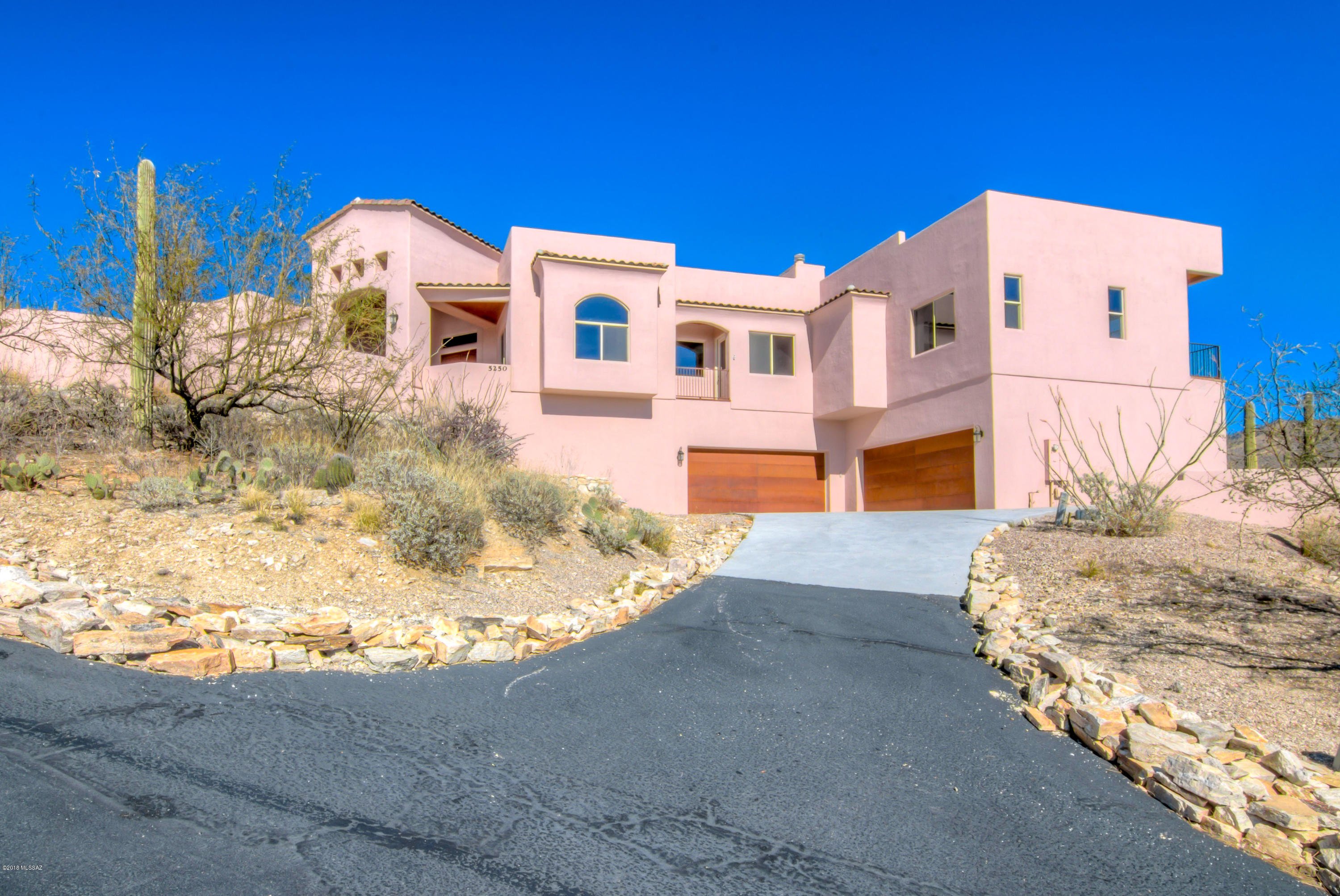 Amazing home in lovely gated Mira Vista!  Majestic panoramic views!   Grand entrance! Glorious recessed lighting and polished concrete throughout the home. Stunning kitchen for the chef in your family.  Kitchen has gorgegous cabinets & granite counter top, prep sink, island, breakfast bar & nook, walk-in pantry, 8 burner gas range, and so much more!  Great room has picturesque windows!    Master Suite has incredible views with an enormous master bath- jetted soaking tub, spacious walk-in shower with dual shower heads, dual sinks, vanity counter, spacious walk-in closet, and 2 large closets. Private outside sitting area.  Each bedroom has on-suite full bathroom.  Garage is heated and cooled with additional spacious bonus room.   Backyard oasis with pool and spa!  Views! Views! Views!