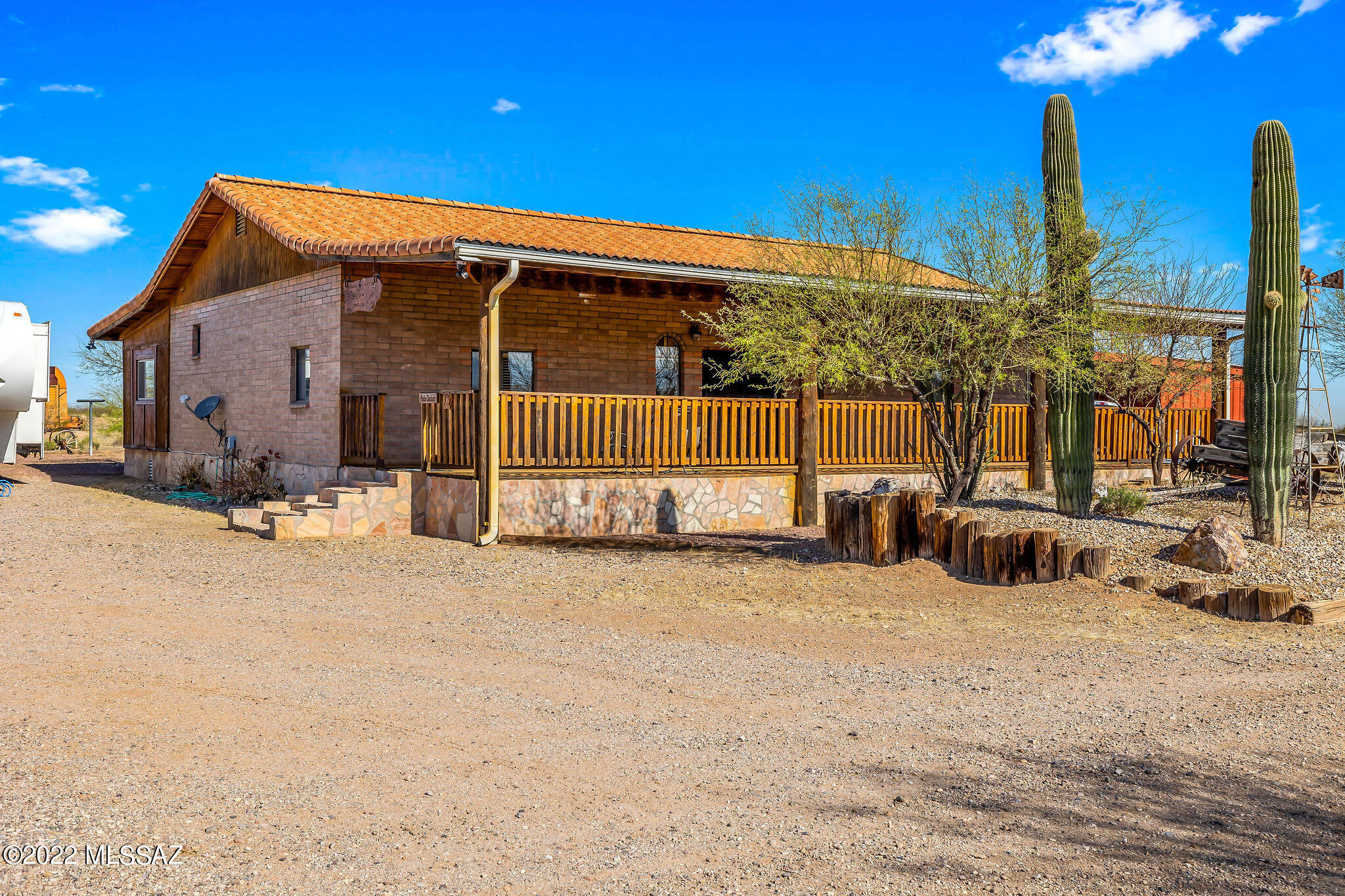 Endless possibilities and potential with this 19.37 acre compound! 1768sqft 2 bedroom, 2 bathroom Brick Home with tons of character! Expansive front and rear porches to enjoy the privacy and tranquility that this property offers. Extensive amenities throughout the property such as Horse Stalls with Sprinklers, Horse Pen/Arena, Mechanic Workshop with 220V service, detached 2 Car Garage, many carports, Shooting Range, enclosed Spa room, etc, etc. Way too many extras to list. There are 2 Wells that service this property, 1 Private and 1 Shared Well. The only way to appreciate everything that this property has to offer is to see it in person, schedule your private showing today!