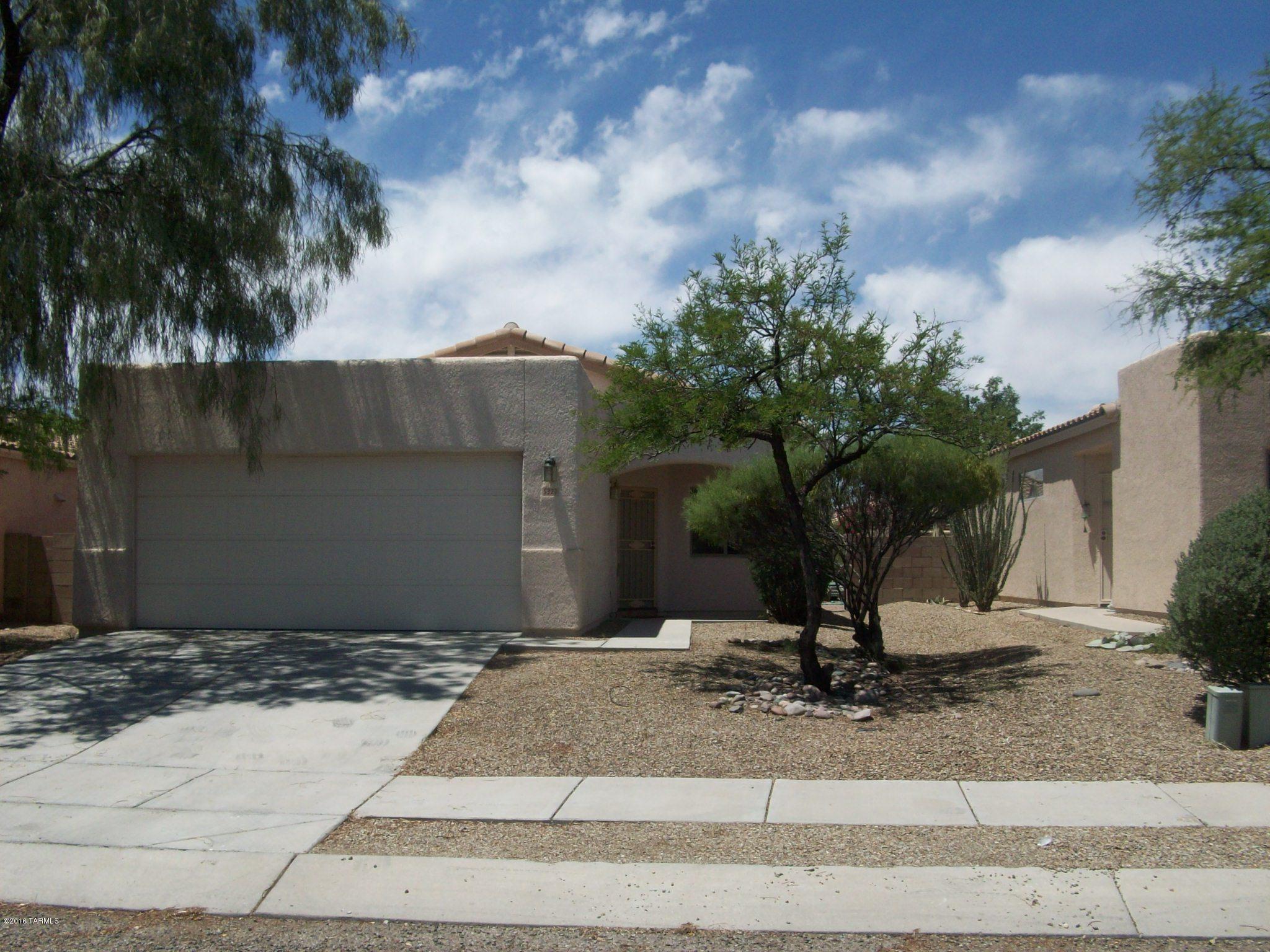 Updated - new flooring and paint - Currently rented - let tenants pay your mortgage.  Great house in a great neighborhood - community pool.  Close to shopping and transportation.