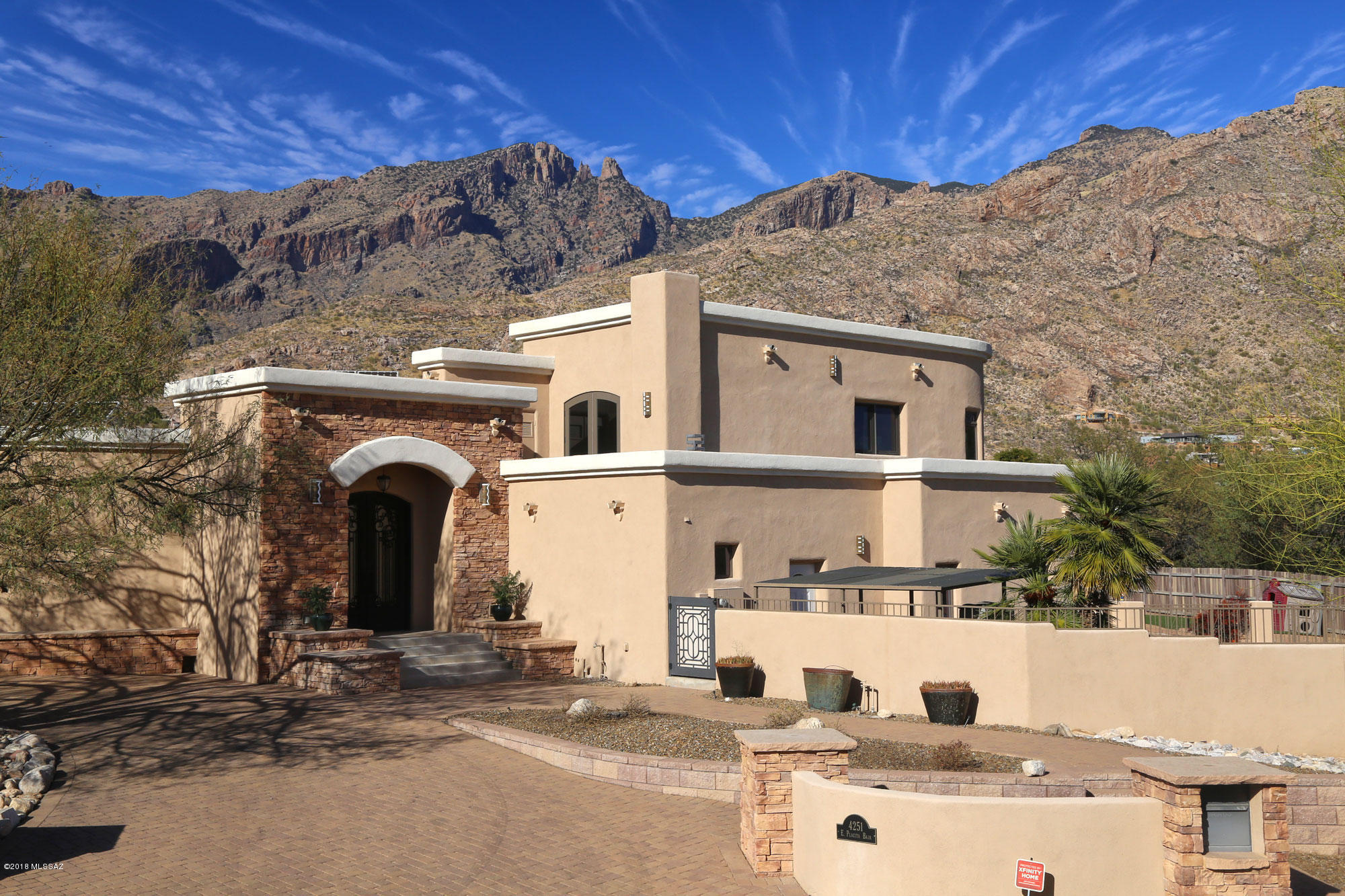 SELLER WILL ACCEPT OR COUNTER OFFERS between $989K and $1,050,000 Stunning Contemporary home w/open floor plan in the heart of the foothills. Sweeping city/mountain views.5bd 4.5bath w/separate office & media room,high ceilings throughout. Floor to ceiling sliding glass wall leads to backyard retreat.Split flr. plan, master suite w/his & hers closets & fitness room w/private courtyard. Abundant storage space throughout. Four car garage, owned solar panels, whole house filtration system,tankless water heater, heated salt water pool. This is a MUST see house.