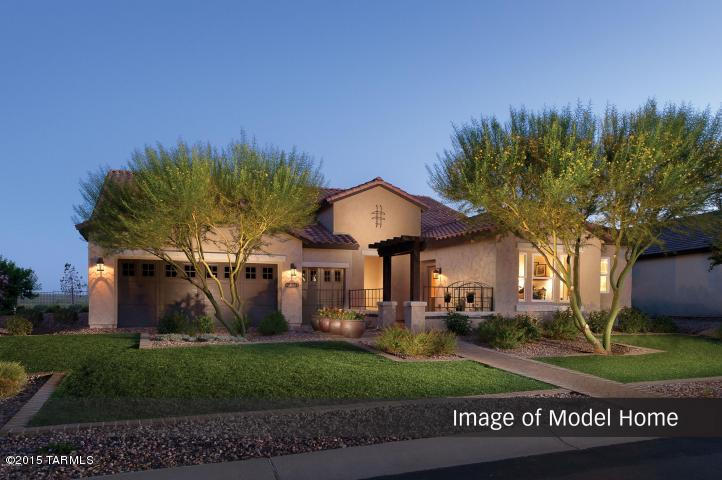 Gorgeous Pima plan! Photos are of model home. Upgrds include:Semi-Overlay Wilmington Alder Cabinets w/Walnut Stain, Staggered Upper Cabinets w/2 glass panels, Quartz Countertops with Full Height Tile Backsplash, SS Under Mount sink, Stainless Plumbing Fixtures & Access in Kitchen & Bath, GE Profile SS Appliances, Quartz Vanity Top w/4'' backsplash & ceramic tile surround & floor in Master bath, Upgraded Clear Shower Door in Master Bath,  Granite Vanity in PR w/4'' tile backsplash, Decorative Vanity Light Fixtures in all baths, Wood Framed Mirrors MB & PR, BBQ Gas Stub, Full  Laundry Cabinets & Sink, Bay Window in Master BR, Upgrd Carpet & 20'' tile, 2 tone paint, 8' Interior Doors, Soft Water loop & landscape.