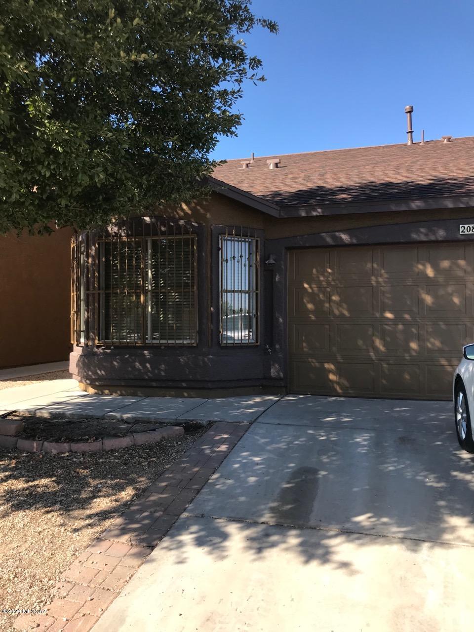 Nice Townhouse in the popular Tres Pueblo Subdivision! In 2019 the exterior was painted and the roof was replaced as well as porcelain tile throughout. 13x13 Storage shed is in the backyard and protection bars on the windows!. 
Walking distance to elementary, middle and High school. Convenient to DM, Tucson airport, shopping and bus stops. Don't miss this well maintained and loved property.