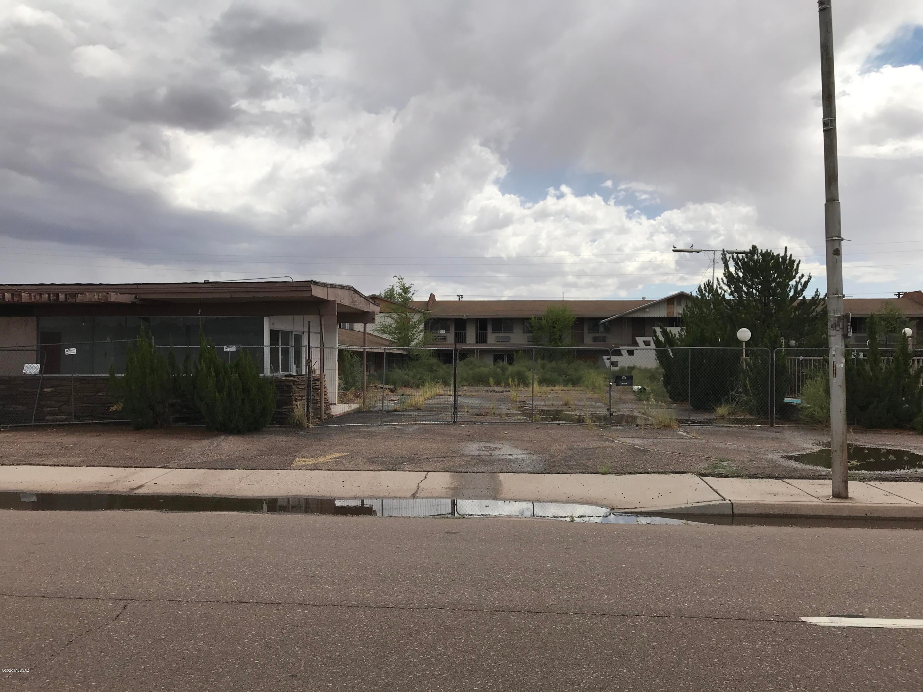 Great big Motel. Classic 60's feel with apartments next door. Looks like the one across sold for double. Make us an offer. It needs work.