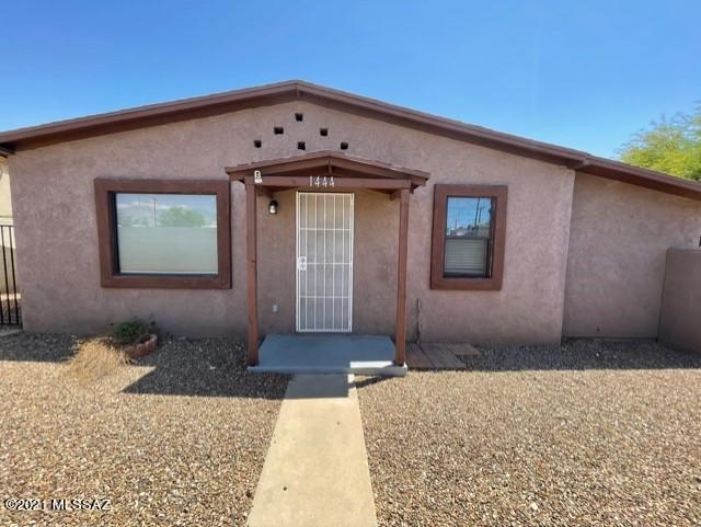 This amazing, completely updated, including electrical, plumbing and windows, bungalow style home is located in central Tucson in the historic district close to U of A and Banner Hospital. The most recent updates were adding a master bathroom, back patio and a detached two car garage and covered parking. Because of the large .19 acre lot and NO HOA, there is room to park a 22ft RV next to the garage! There are so many upgrades in this home you have to see it to believe it! Don't wait, it won't last!