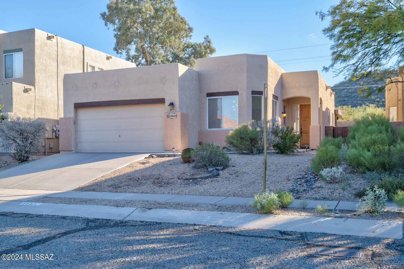 Welcome to your new slice of paradise in Tucson's west side! Picture this: a cozy 3-bedroom, 2-bathroom home nestled in a quiet cul-de-sac with the beautiful Tucson Mountains as your backdrop. Spanning 1426 sq ft, this home isn't just about space, it's about creating your own personal haven. The primary bedroom isn't just big, it's your new retreat with a walk-in closet and a comfy ensuite. Love to cook? The kitchen and dining areas are separate, perfect for unleashing your inner chef or hosting dinner parties. And when the evening cools down, your backyard is the place to be - think BBQs with the built in grill and friends or peaceful nights under the stars, all in your private outdoor space. Plus, you're just a stone's throw from Pima Community College West, breathtaking hiking trails, the luxe Starr Pass Resort, with of course its well manicured golf course, and not to mention an easy hop onto I-10. It's not just a home, it's your key to the vibrant Tucson lifestyle.