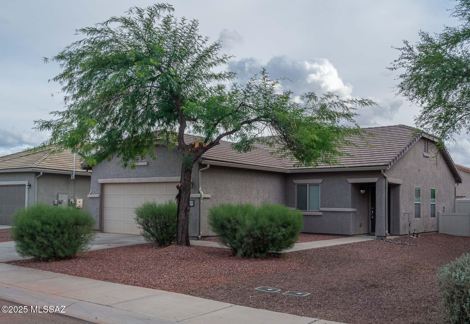 Immaculate three-bedroom home in Red Rock!
Move-in ready with brand-new laminate vinyl plank flooring, new carpet, and fresh paint throughout. Enjoy updated window coverings, tile roof, ceiling fans, and neutral color tones. The community offers fantastic amenities, including a pool with a waterpark, baseball fields, a skate park, playgrounds, and miles of bike and walking paths.