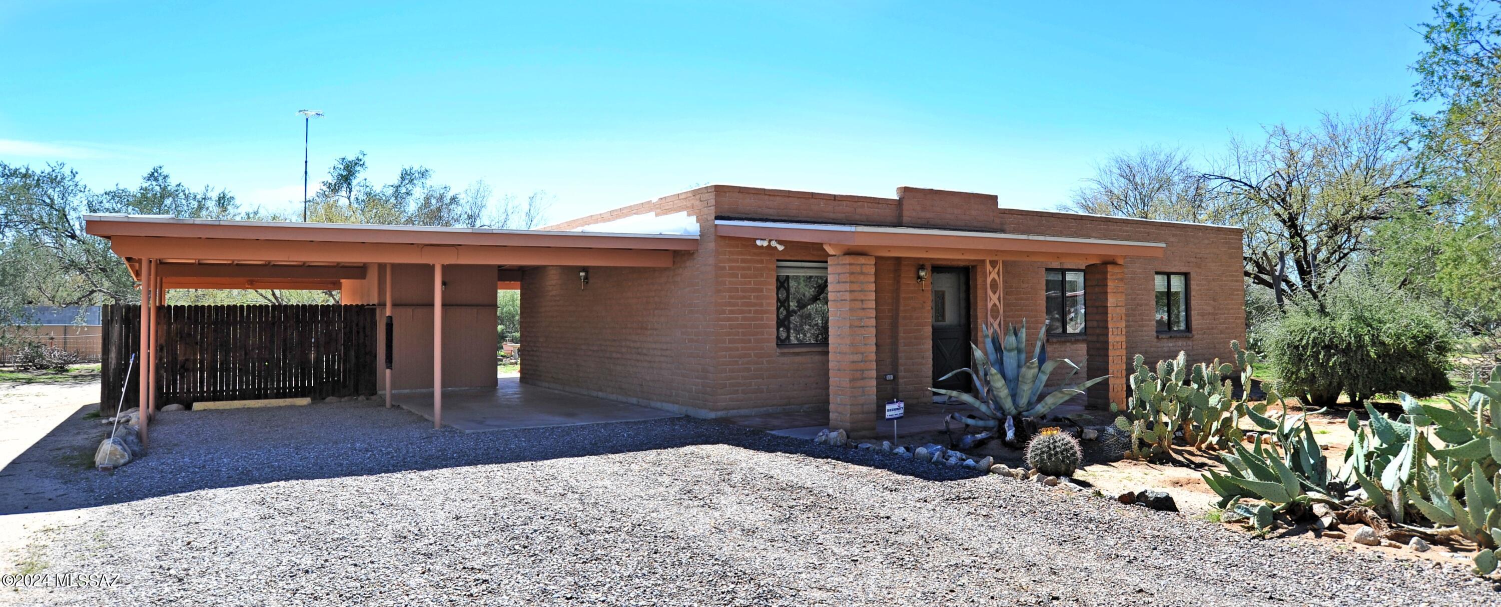 This is a must see! Horse property on large and beautiful 1.10 acre lot in a great location within minutes of schools, shopping & recreation.  Charming home featuring all tile and 3 bedrooms/2 baths ready to make your own.
Separate laundry room off patio with storage and a freezer.  Separate freestanding workshop in backyard.