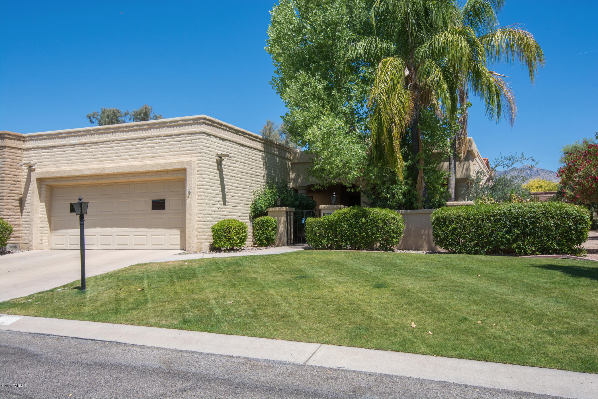 Come enjoy the popular quality masonry home in the Riverbend community at the back side of the neighborhood close to Sabino Canyon and the River Walk. Lush grounds with gated entry. Private court yard as you walk into the double front doors into an open concept floor plan with vaulted ceilings & kiva fireplace. Light and bright sets the tone for the eat in kitchen. Kitchen offers lots of natural light. Custom plantation shutters throughout. Interior newly painted, May 2016. Carpet cleaned in May 2016. Extensive storage with walk in closets in both large bedrooms. Lush, private and quiet back court yard with covered patio. Community pool & Spa heated year round, recreation center with tennis court.