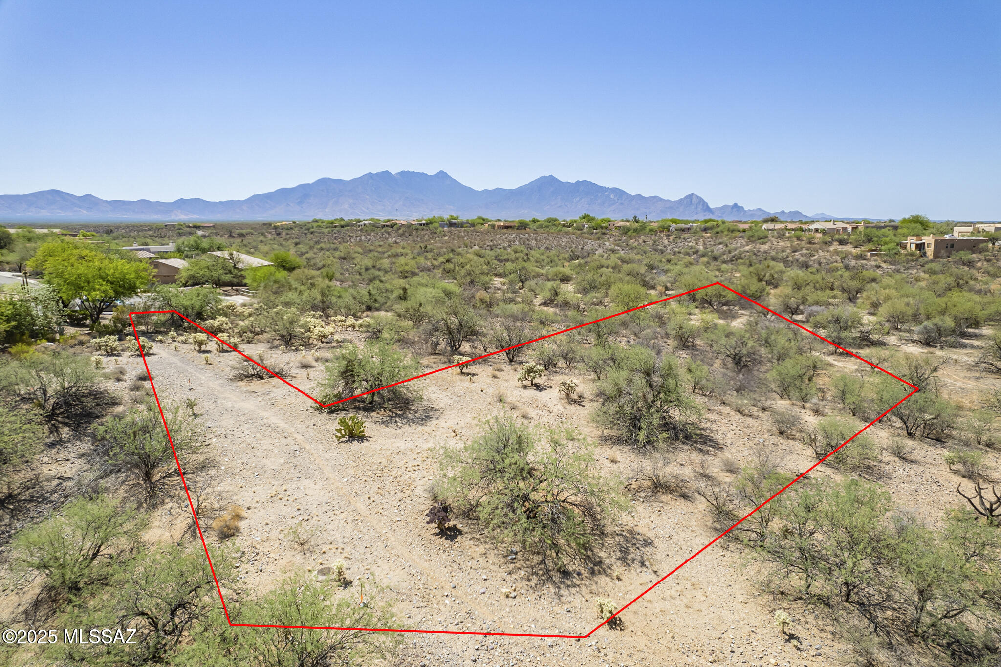 Build your dream home on one of the best home lots in Madera Reserve, a peaceful, established community known for its natural desert beauty and custom homes. As you enter the lot, you'll be amazed by the stunning views of the Santa Rita Mountains and ample space and flexibility to design the perfect desert retreat. Surrounded by preserved open space and mature desert vegetation, enjoy the privacy and tranquility that sets Madera Reserve apart. Utilities are to the lot line and the sewer line is in the building envelope. The layout of this lot makes it ideal for building with minimal site prep. Whether you're looking for a seasonal escape or a full-time residence, this homesite offers the perfect canvas for southwest living.