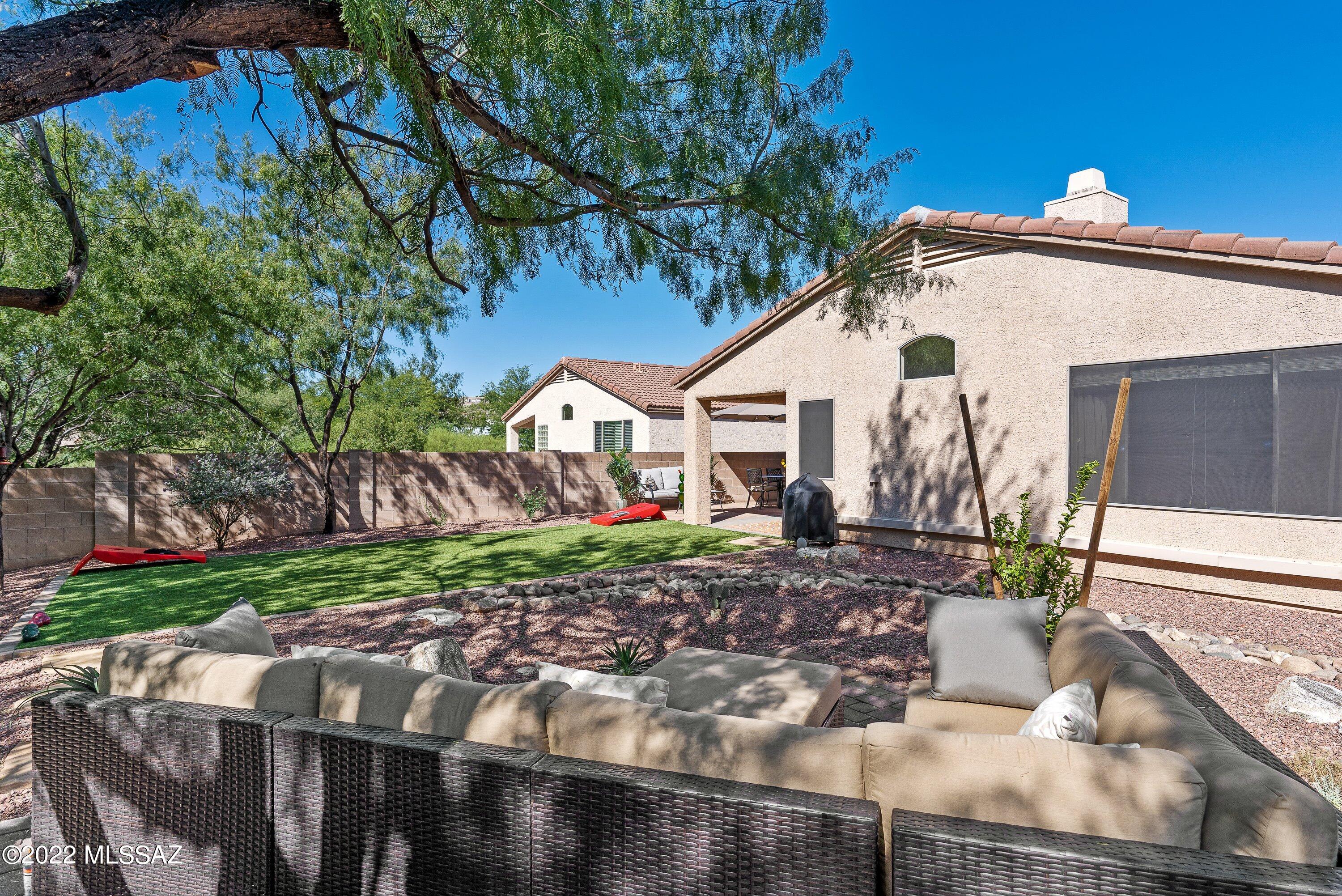 Luxurious recently renovated vacation rental / corporate housing in the Catalina Foothills.  This charming fully appointed single family home features a secluded backyard with synthetic grass & an abundance of sitting areas surrounded by lush desert landscaping and breathtaking mountain views, private cul-de-sac location, an open kitchen with granite counters and roomy pantry, updated primary bedroom with walk-in closet, king bed and high-end bathroom features, great room layout with a plethora of windows providing natural light throughout the home, North / South orientation, ceramic tile flooring, Murphy bed, recently installed light fixtures & ceiling fans and a popular Northern Tucson location just South of Sabino Canyon with shopping / restaurants nearby. CALL FOR SEASONAL RATES!