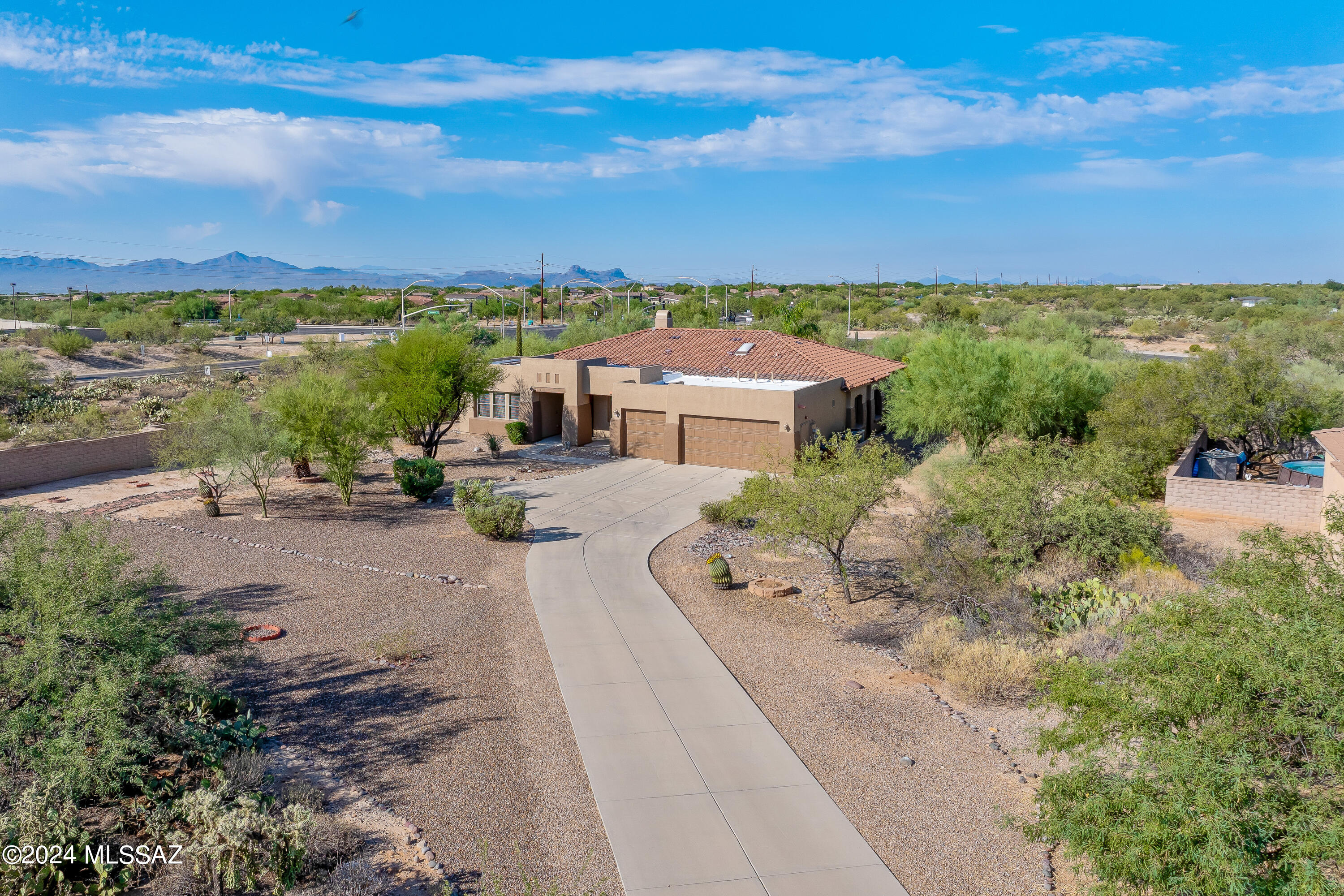 Seller will consider offers between 850K-870K. Meticulously cared for home with panoramic views and breath taking sunsets in a Gated Community! The 3-car garage plus extra long driveway. Inside, you'll see a formal dining, spacious living room, and luminous family room with a gas fireplace, providing endless entertainment possibilities. The eat-in kitchen has a Corian countertop breakfast bar, plenty of storage, and offers all new appliances. Primary bathroom boasts a dual sink vanity with a makeup area, a garden tub, and a step-in shower. The backyard is an excellent place to host fun gatherings with its covered patio, low care landscaping, lovely pavers, pool and spa. Financed solar generation, including a Tesla Powerwall 3 for energy storage and whole house power backup. This home also includes a newish HVAC and water heater (2022), brand new water softener and roof underlayment replaced last March.