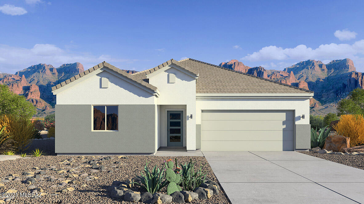 Beautifully finished 4 bed 3 bathroom home with ceramic tile, Quartz counter tops in kitchen and bathrooms, 36'' updated cabinets, 41/4'' base boards, SS gas appliances and much more.  Nestled in a quite peaceful community only 2 minutes to the freeway. PLUS Beautiful Community Views of the Catalina Mountains!!  You will not be disappointed.  Come take a look!