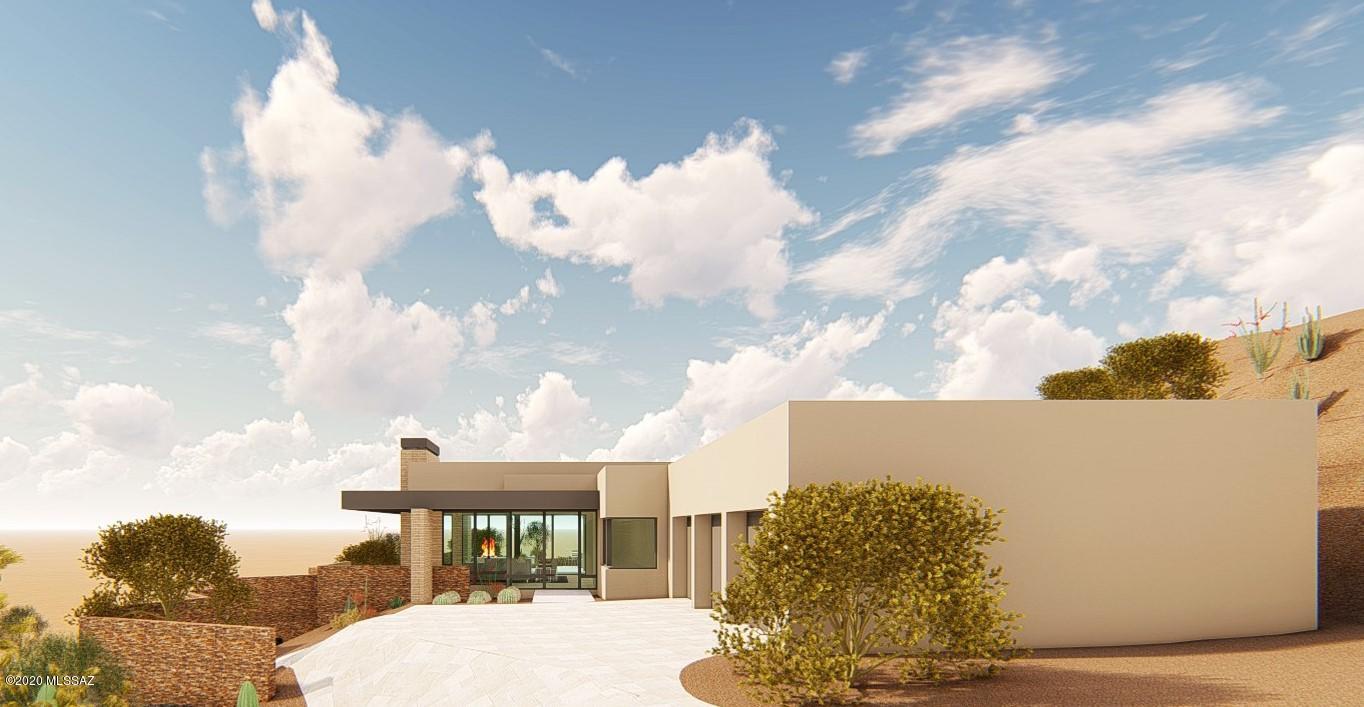 Views from sunrise to nighttime city lights. and mountain ranges in every direction, this home will have among the best views in Saguaro Ranch.  Imagine living among towering saguaros and incredible wildlife in a home designed by renowned architect Ron Robinette, designer Lori Carroll and built by Miramonte Homes. Included high-end kitchen finishes featuring Wolf and Sub-Zero appliances, En-suite guest rooms, two fireplaces, open flowing floor plan. Saguaro Ranch Club is optionally available  and world class golf available in the area.  Short walk to Saguaro Ranch Club.***