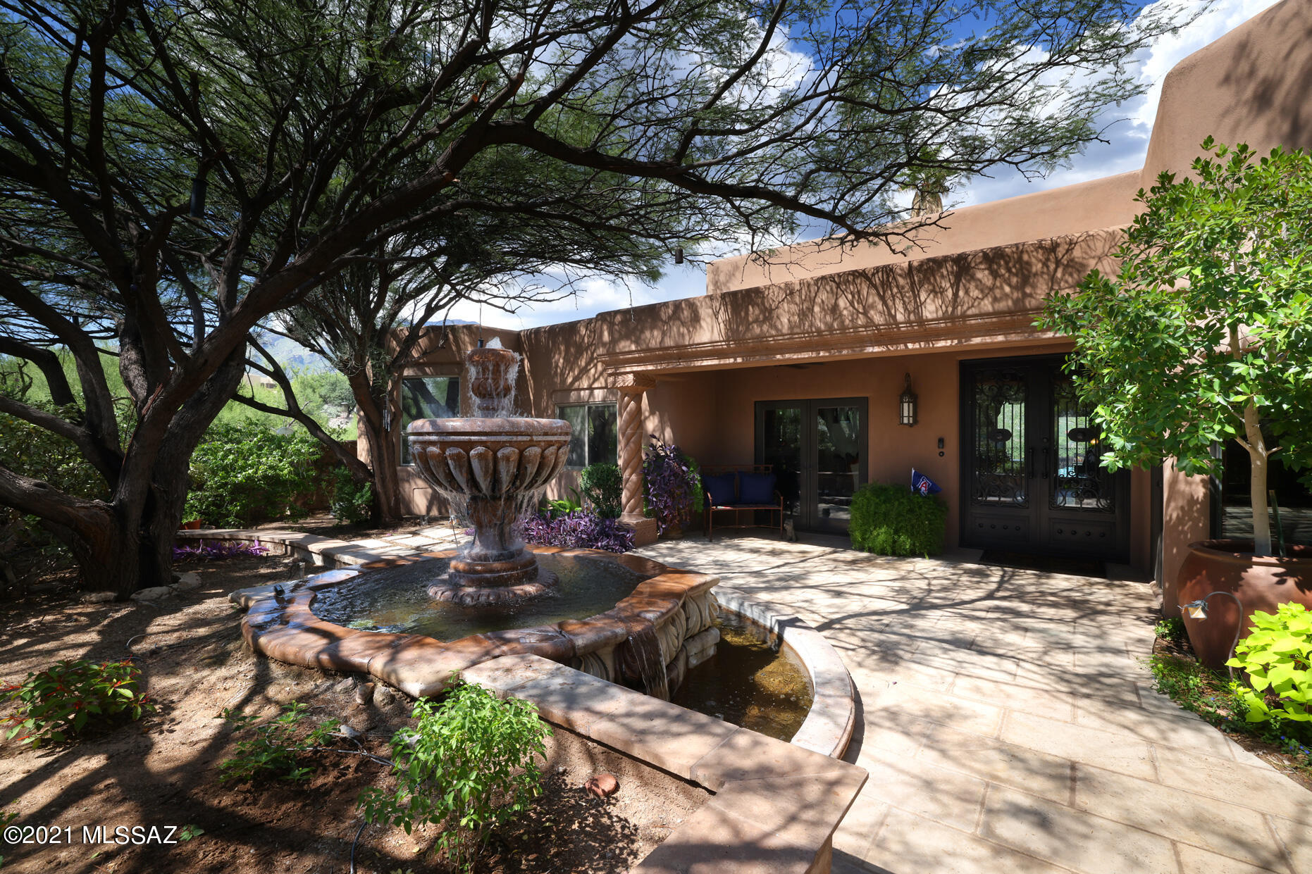 Fabulous house with incredible finishes throughout. Spectacular vistas of Catalina Mountains from Long covered patio. Large resort style backyard with pool, spa, trampoline and fire pit area. Indoors enjoy formal casual living in elegant living, family and dining rooms with high ceilings and two sided fireplace. True gourmet cook's kitchen Viking appliances, double freezer and refrig, gaggenau steam oven, 2 dishwashers, and wine refrig. En suite bedrooms with outdoor game room, office with custom built ins, exercise room and home theater. private 1 acre lot with views of Ventana Canyon golf course. Newer A/C units, Mud room. Home was featured in Tucson Lifestyle Magazine.
Dont miss viewing  the 3D walk thru virtual tour.