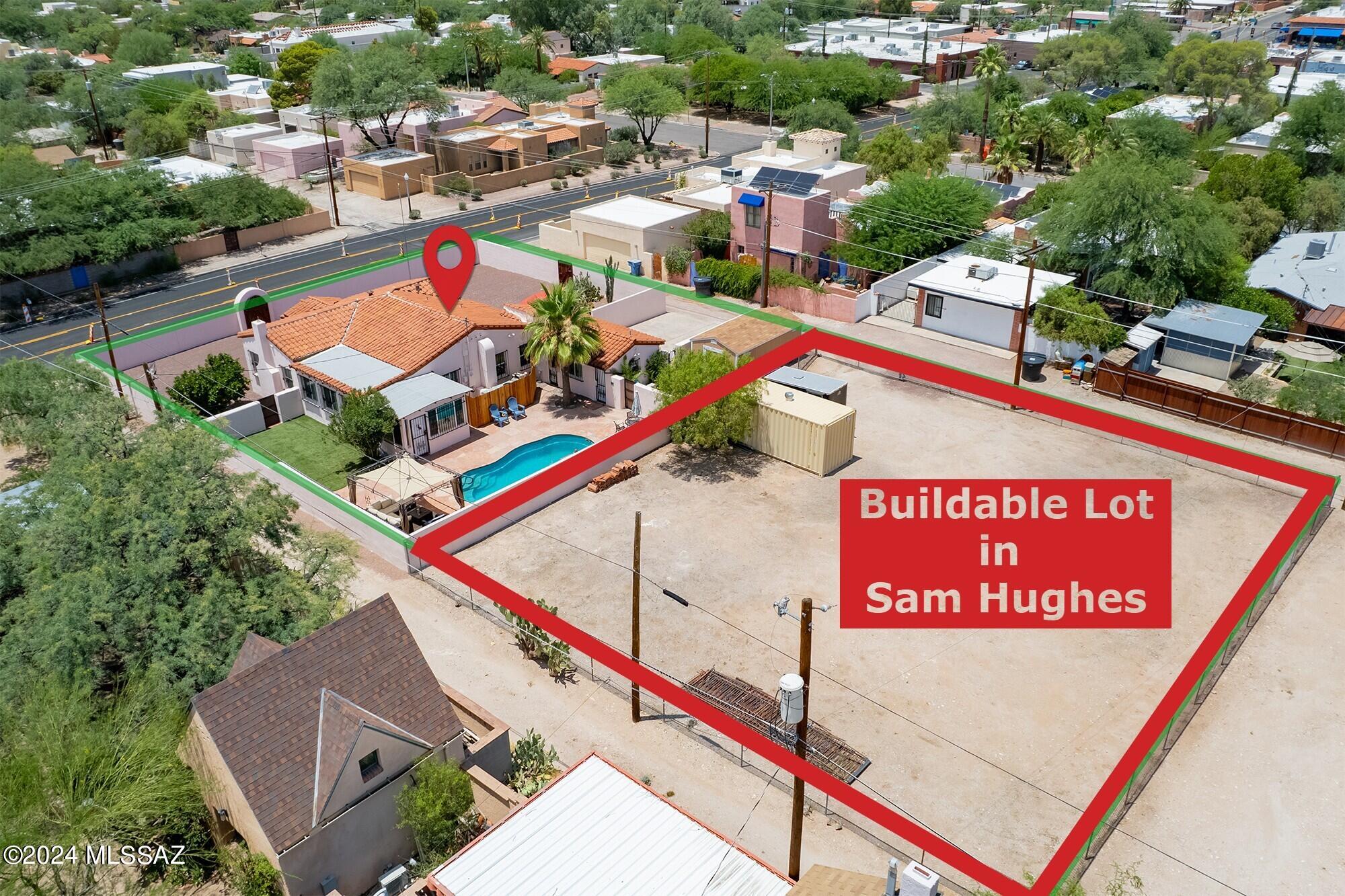 Your opportunity has arrived: a rare buildable lot in coveted Sam Hughes. Imagine the potential—a space to build your dream garage with living quarters in this sought-after neighborhood. Picture the income potential of constructing a single-family residence on approximately 8,000 square feet of prime land.
Nestled on approximately 18,000 square feet of land, the main house exudes character with original hardwood floors and cedar closets. The kitchen and bathrooms have been tastefully renovated, featuring modern amenities and stylish finishes.
Updated electrical systems, a new water main, PVC lines, and double-pane windows ensure efficiency and comfort throughout the main house. Brand new appliances further enhance the appea For added convenience and flexibility, the property includes separate guest quarters complete with a kitchenette and a Murphy bed, ideal for hosting visitors or generating rental income.
Step outside into the tranquil backyard oasis, complete with a refreshing pool and a charming ramada, perfect for relaxation and entertaining. A new block wall encircling the property provides privacy and shields against road noise, creating a peaceful retreat.
And there's more to love! Adjacent to the main house is approximately 8,000 sq.ft BUILDABLE LOT, offering endless possibilities for expansion, gardening, or additional development.
Located in the highly desired Sam Hughes Community, this property is within easy walking distance to a variety of restaurants and shopping destinations, adding to its allure and convenience.
Don't miss out on this rare opportunity to own a piece of Tucson's history with modern comforts and the potential to customize your living space. Schedule a tour today and experience the unique charm and versatility this property has to offer!