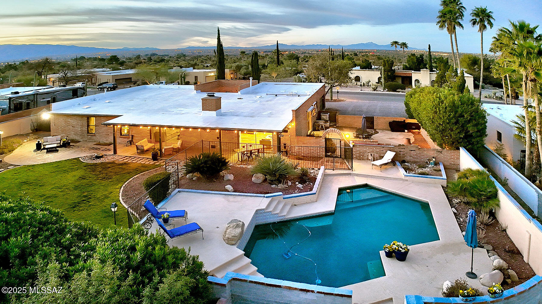 Charming and classic private home in Sabino Vista with updated indoor and outdoor living spaces. Enter through a private courtyard, ideal for cozy conversation or morning coffee. Enjoy a gourmet kitchen with quartz countertops that opens to the family room, with a view of the pool and landscaped yard. The covered backyard patio provides shade while you enjoy the mountain views. The formal dining room entices family and friends to stay for a lingering meal. Primary bedroom has updated ensuite bath with walk-in shower and soaking tub.  Four additional bedrooms and an updated bath complete this very homey space. Neighborhood includes walking trails, and property is minutes away from Sabino Canyon . Oversized Garage. This home, this price, I would not miss it!