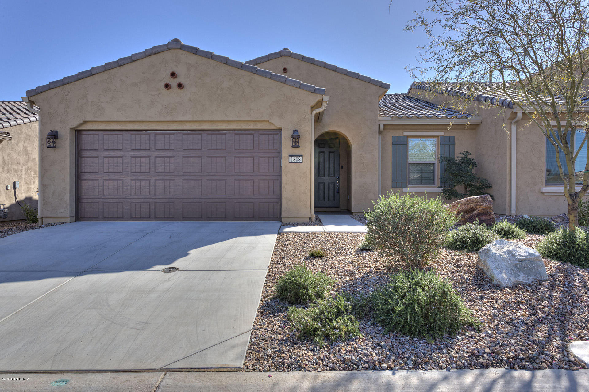 Almost new Quail Creek Villa. Let your HOA take care of all the maintenance outside and enjoy the adult lifestyle that Robson Quail Creek has to offer. Very nice, neat, clean 2/2 bath villa that sits on a beautiful private lot w/desert behind you. NO OTHER HOUSES. Roll in master shower that is beautifully tiled w/upgraded door. Kitchen offers pull out shelving, granite composite sink and much more. From the great room & kitchen you can see out the large windows to the desert view. Priced very well to sell quickly.