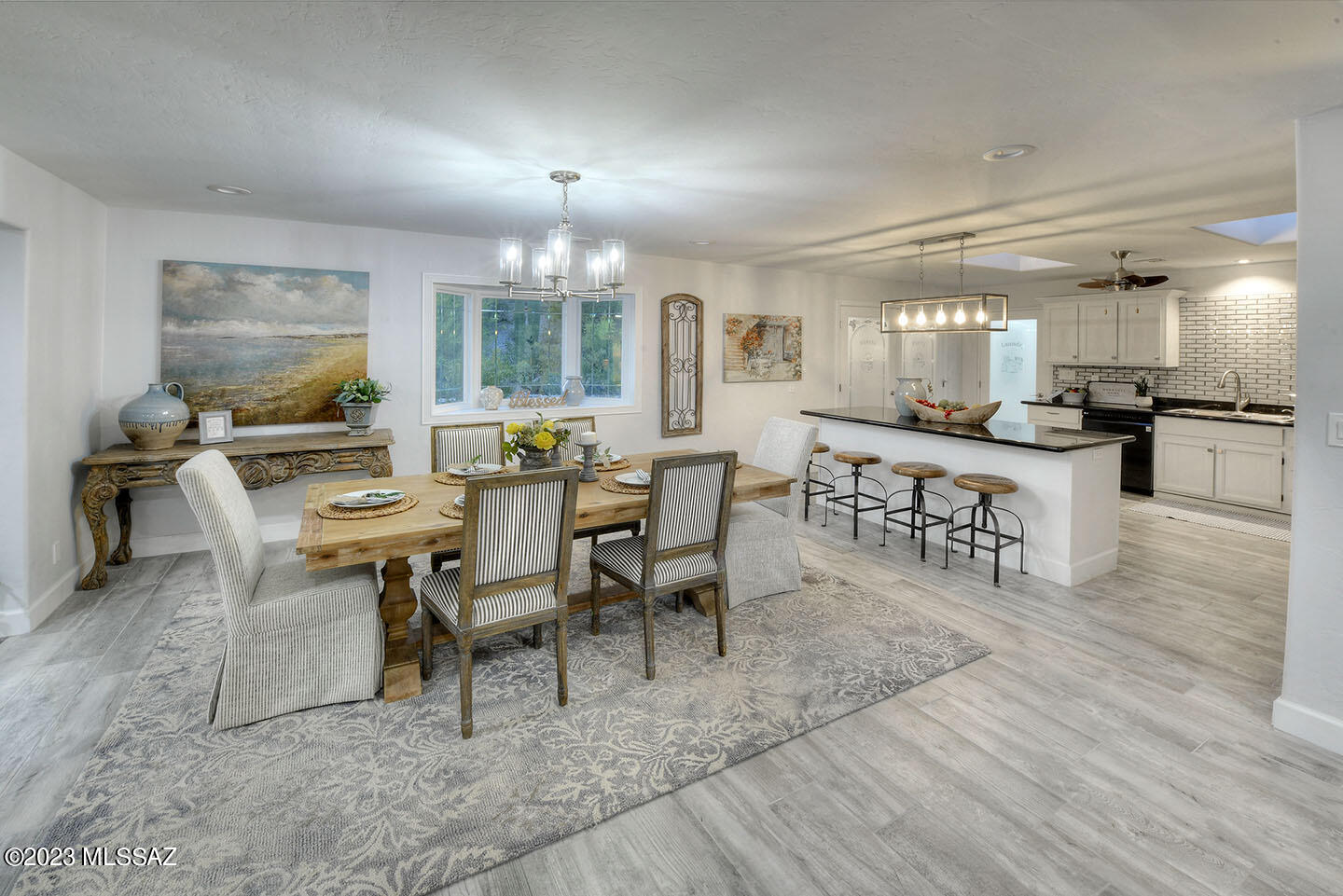 Rare Treasure in Oracle Foothills Estates! Exquisitely remodeled Four Bedroom/Five Bath Home plus Den on .9 Acres (One Bedroom has its own Separate Entrance, Bathroom & Kitchenette. Perfect for guests or rental!). No HOA(voluntary), owned SOLAR, plus room for an RV! Large acreage provides room for a garden, chickens and even a horse!  A gallery of windows overlooks the fully walled yard, pool, fountain and ramada. Close to the city, yet out in the country; straight shot down First Ave to Downtown and UofA.  Wildlife and native plants characterize this desirable foothills location!