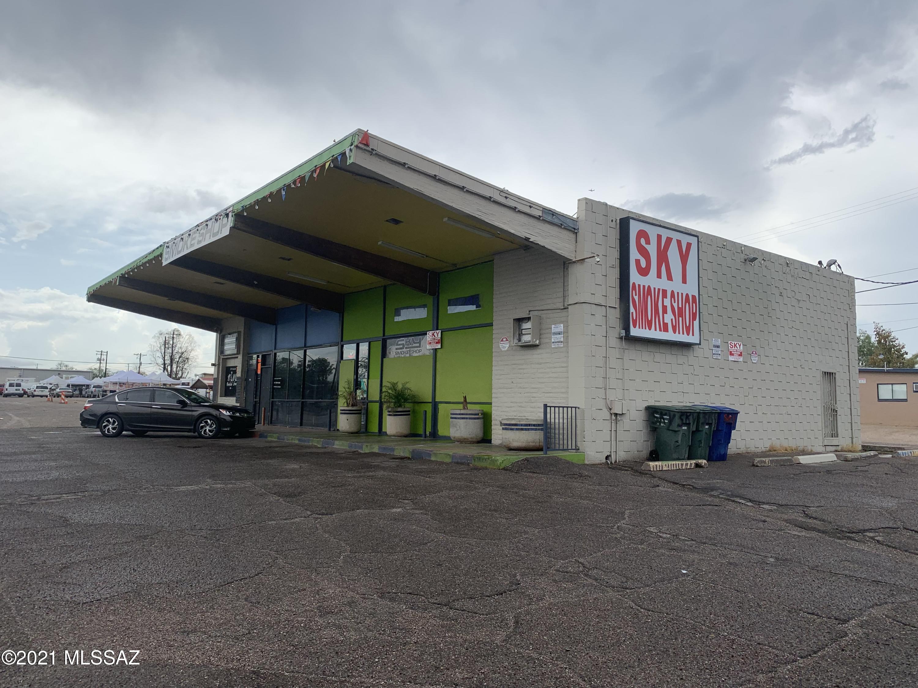Prime commercial location on Grant Road. Adjoining lot included with purchase.