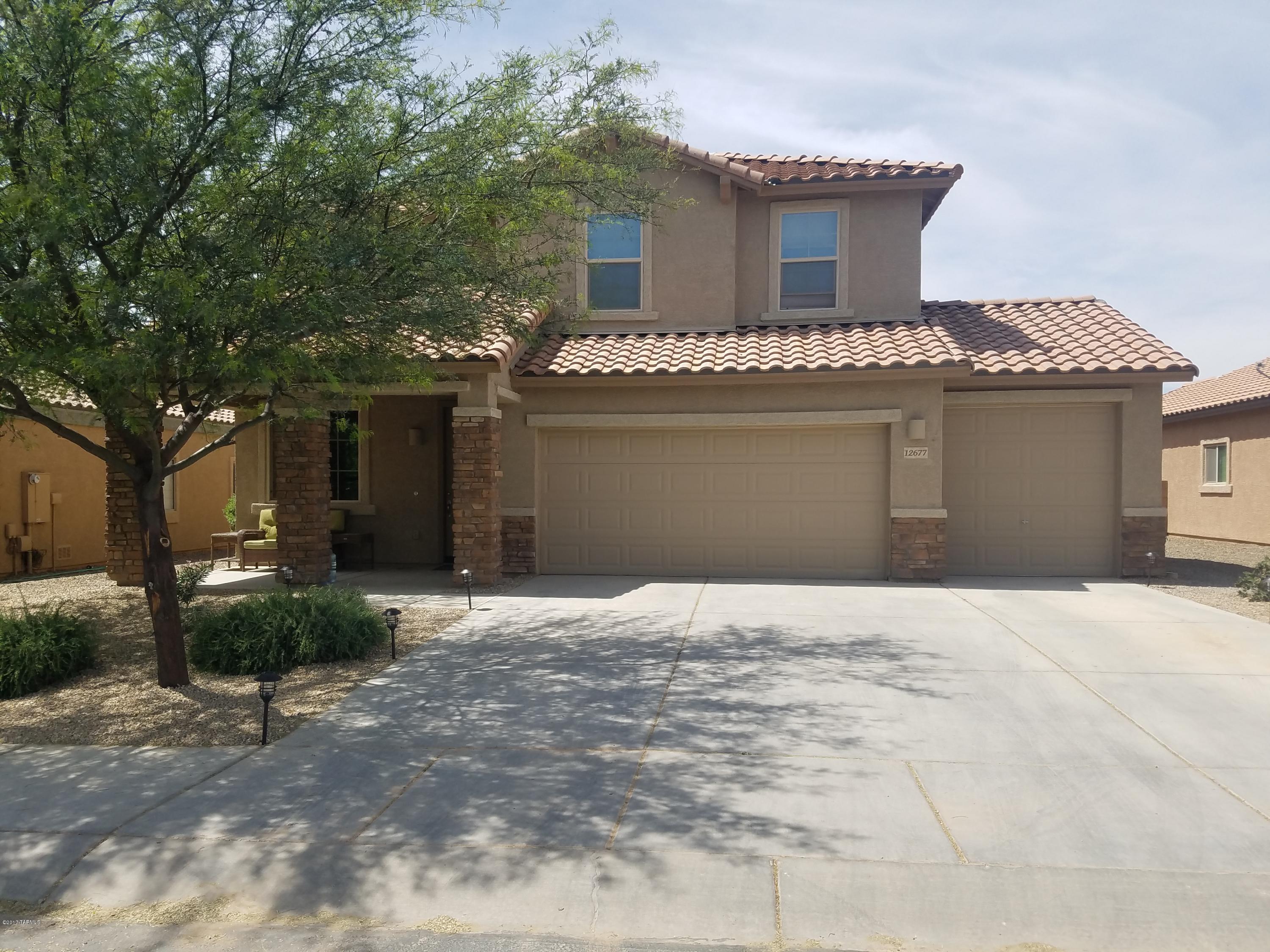 This big Columbus plan will comfortably accommodate a large family and has a 4 car garage. Upgrades include luxury flooring and gourmet kitchen upgrade complete with upgraded cabinets with handles, granite countertops, custom backsplash and stainless steel appliances. Entire house has been freshly painted and new upgraded carpet in the last year. Spacious backyard with additional patio and NO back door neighbors. Neighborhood has numerous playgrounds, jogging/bike paths and a splash pad. Motivated seller.