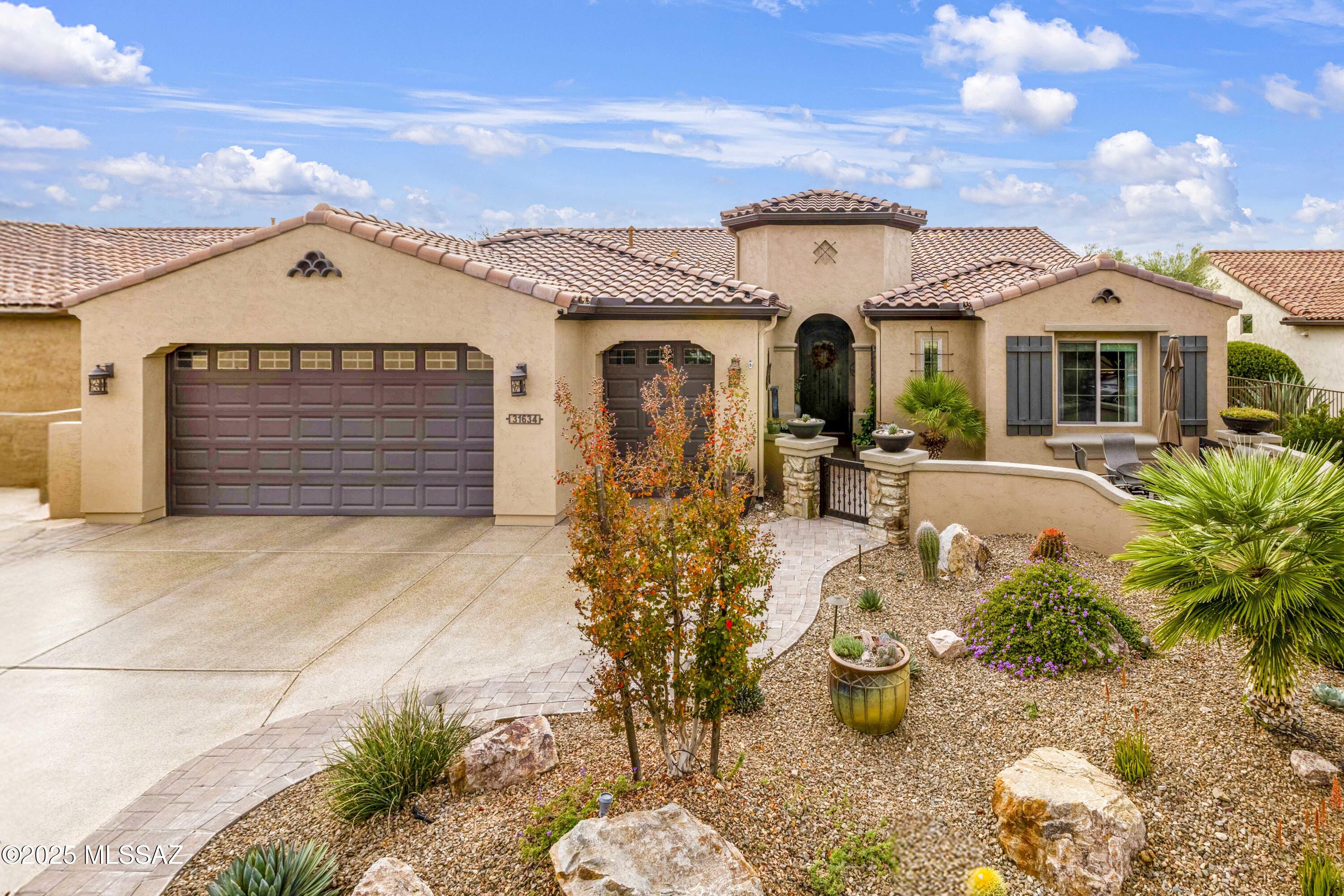 You will instantly fall in love with this stunning and highly upgraded Tesoro - Premiere Series in SaddleBrooke Ranch! This home includes a Custom Tile Entry Way; 2-Bedroom En Suites; Powder Room, Great Room w/Media Alcove and; Dining Room; Grand Kitchen Island with adjoining Butler's Pantry  Walk-In Pantry; Dining Room; Spacious Office/Den that can double as an extra bedroom; Owner's Entry Valet with Cabinets; Walk-In Coat Closet; Walk Up Wet Bar w/wine refrigerator; Large Laundry Room; Deep 2-Car Garage + Golf w/Extra Storage; a Covered Outdoor Living Space w/Tucson Rolling Shades, 9', 10', 11 foot ceilings throughout the home, + various types of window coverings. The Master Bedroom En Suite has 2-Walk-In Closets; Dual Vanities; 42'' X 60'' Walk-In Shower with Seat The 2nd Bedroom En Suite has a Walk-In Closet; and Shower/Tub Combo. The view from the Great Room and Dining Room into the backyard is truly what defines this home. Washer/Dryer and Refrigerator convey with the home. Added Bonus: this home has Whole House Fire Prevention System. The backyard is an entertainer's oasis with custom built pool with various 4-sitting areas surround the pool that has incredible water-features and the latest technology in cleaning the pool! The backyard is completely fenced. The garage has epoxy coated floors, and a water softener. Whether you relax out in the exquisitely designed entertainer's backyard or under the covered living space or the recently installed powder-coated aluminum "Pergola" with lighting and a fire-pit, while BBQing and watching the incredible sunset off the back, you will realize it does not get any better that this!
ADDED BONUS: Seller just put in a NEW Water Filtration System on 11/19/25!