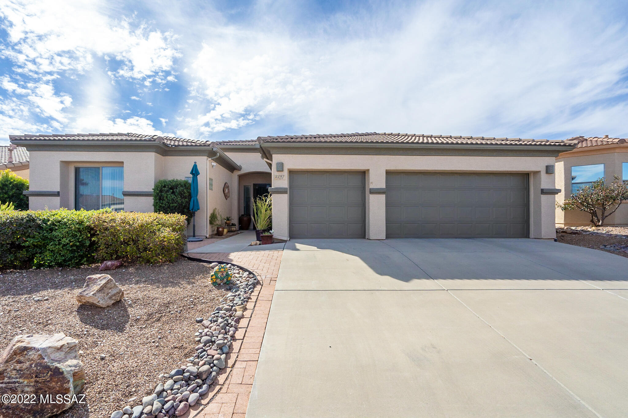 READY TO MOVE RIGHT IN! You will enjoy the many seller upgrades including newer kitchen appliances, granite counter tops, and beautiful tile floors through out. Just the right size with 2BR, 2BA, den and 3-car garage. The back patio covered area was extended providing relaxation and privacy. Recently painted inside and out. Cozy gas fireplace in the great room. The slider, main bedroom, and den windows have been replaced with Anderson windows. Water softener, kitchen pull outs, ceiling fans and don't forget the MOUNTAIN VIEWS from the front patio!