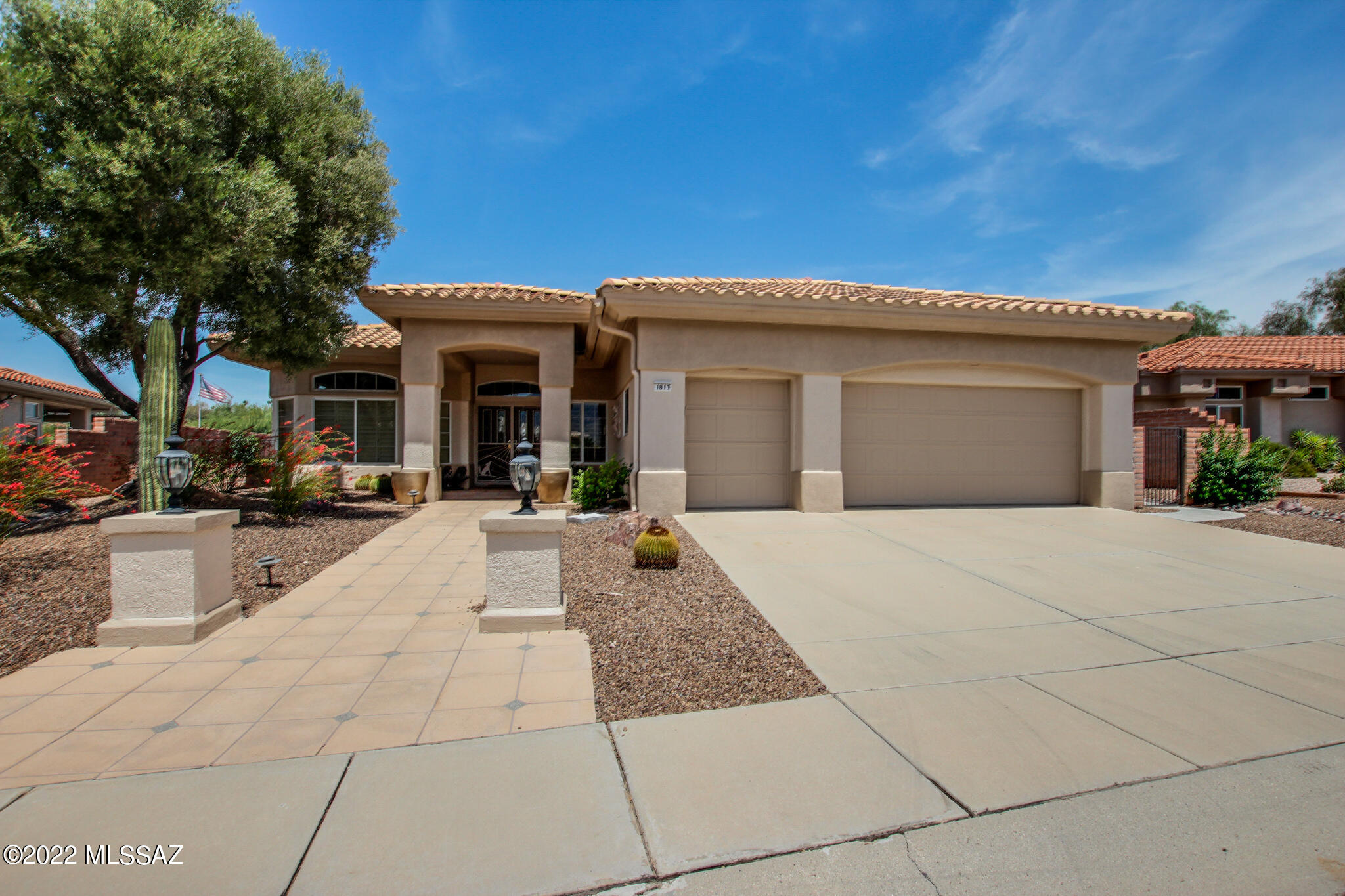 This gorgeous, furnished, luxury home is the desirable Ridgetop Model, located in the coveted community of Sun City Oro Valley. From high up you can watch amazing sunsets over the Tortolita Mountains & the ninth hole of The Views Golf Course. Enjoy the formal LR/DR w/bay window. The spacious kitchen w/gas cooktop, double sink, appliance cubby and dining nook opens to the family room which boasts a cozy fireplace. This home showcases a huge master suite with sitting area overlooking the golf course, a large second bedroom, a guest BR/den with a Murphy bed & 2.5 baths. Almost every window in the home has a view. Storage abounds with the laundry room inside home & two car + golf cart garage w/tons of storage cabinets. Enjoy Catalina Mountain views from your front patio, too. Welcome home!!