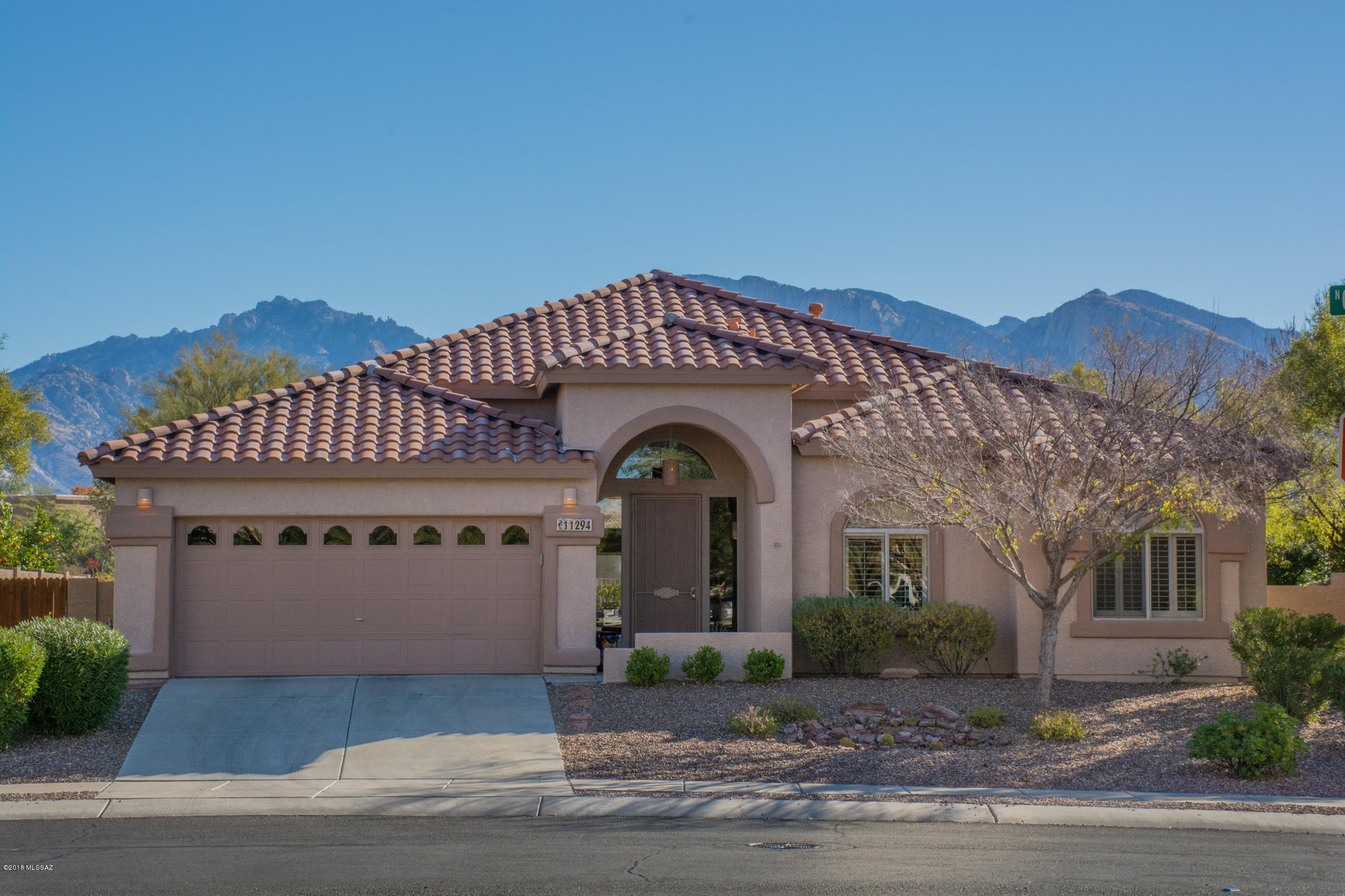 You want VIEWS?? You want REMODELED?? You want to have a house in mint, move in condition?? Well then, YOUR SEARCH HAS ENDED!! This 2050 s/f 4BD/2BA home offers you the BEST unobstructed view of Pusch Ridge from the minute you walk through the front door!! It was completely upgraded in 2016 with kitchen cabinets, granite counters, new fridge, oven, microwave  & dishwasher..engineered hardwood floors, carpeting in bedrooms, fans, lighting, plantations shutters, remote sunshades...the list goes on and on!!! Even an epoxied garage floor!!! This house needs to be seen FIRST!! You will not have to look any further!