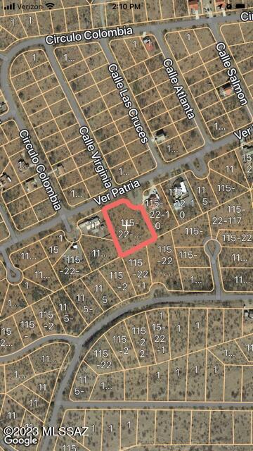 Two lots that have been combined into one parcel.  1.38 acres with great views.  Mostly flat and usable.  Water is at the street.  This lot might be able to connect to the sewer that serves Villas 12 across the street.  Electricity is at the street.
