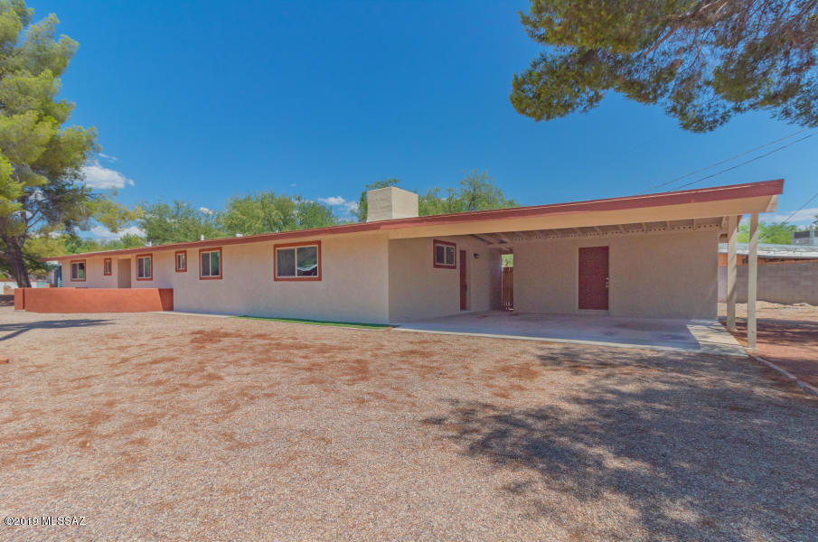 Welcome Home! Walk into your stunning ranch style home that boasts new tile flooring and carpet throughout enjoy two wood burning fire places perfect for those cool desert nights! Entertain and create great meals in your newly remodeled kitchen, enjoy breakfast on your granite count tops enjoy the stark white cabinetry, stainless steel appliances which add the finishing touch! Enjoy three spacious bedrooms and bathrooms that feature granite counter tops and exquisite tiled showers/bath. This beautiful, clean and simple palette will embrace your furnishings from the start! Step outside and enjoy your low maintenance yard perfect for grilling and entertaining!!!