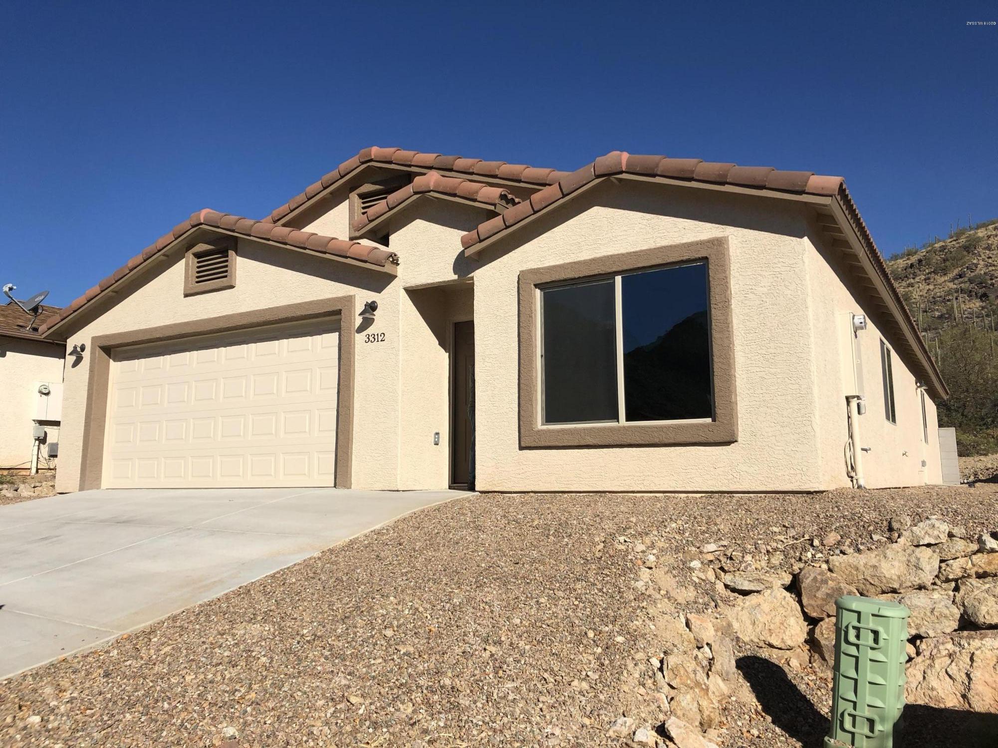 Beautiful NEW construction home, far away from the city but still minutes away from shopping center and Downtown Tucson! GREAT Location, nestled in a saguaro studded mountains! Kitchen and bath have granite countertops. Master has walk in closet and beautiful mountain views. Also, home comes with 1-year home protection plan along with Home Warranty plan- buyers choice! This home is a must see