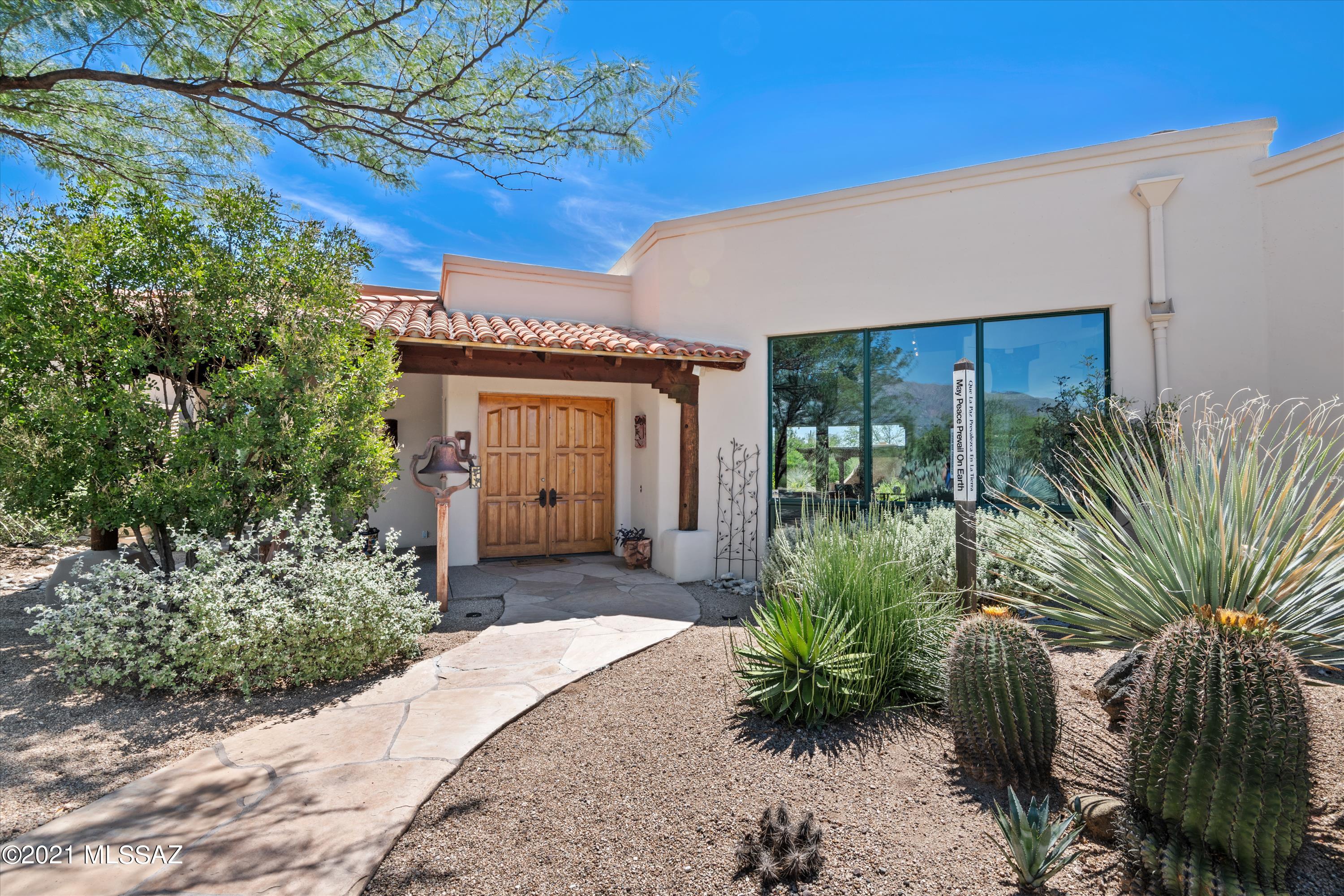 Beautiful Masonry Custom Built Home in Flecha Caida Estates. Very Private 3 bedroom home on 4 acres. Office/Den can be used as a 4th bedroom. Incredible Cook's kitchen with so many amenities. Plenty of space to prepare simple to extravagant meals. 2 walk in pantries. 2 dishwashers. Large windows capture the stunning Catalina Mountain Views. Spiral Exterior stairs lead to the roof deck. This home has Solar and 2 Cisterns to keep utilities low. This is a must see home! Don't miss out! NO SHOWING TIME!