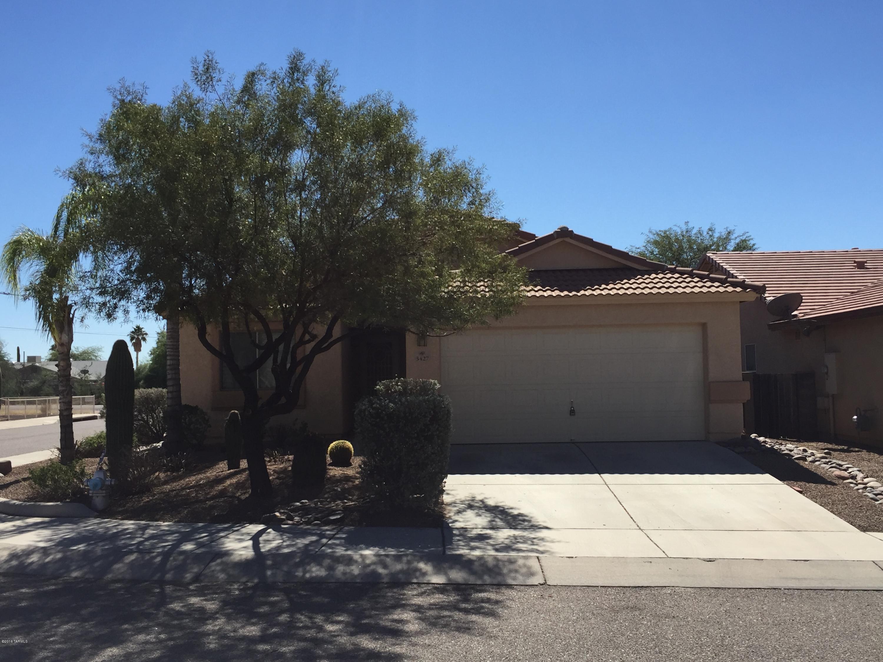 Beautiful corner lot home in the highly desired NW side of town! 3 bedrooms, 2 bathrooms, 18 inch tile throughout enter home. Close to schools, shopping, parks, 1-10.  Low care landscaping in both the front and backyard.