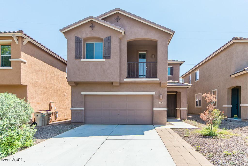 4BD, 3BA home for sale in highly desirable Presidios At Rancho Sahuarita!  House features tile and carpet, and neutral paint throughout.  Kitchen features upgraded cabinets and all appliances included!  Master bedroom on second floor with huge walk-in closet.  2nd bedroom features walk out balcony.  Laundry room conveniently located on the second floor as well.  Back yard has a covered patio, and an extended concrete pad for summer BBQ's.  No neighbors to the rear.  Schedule your showing today!