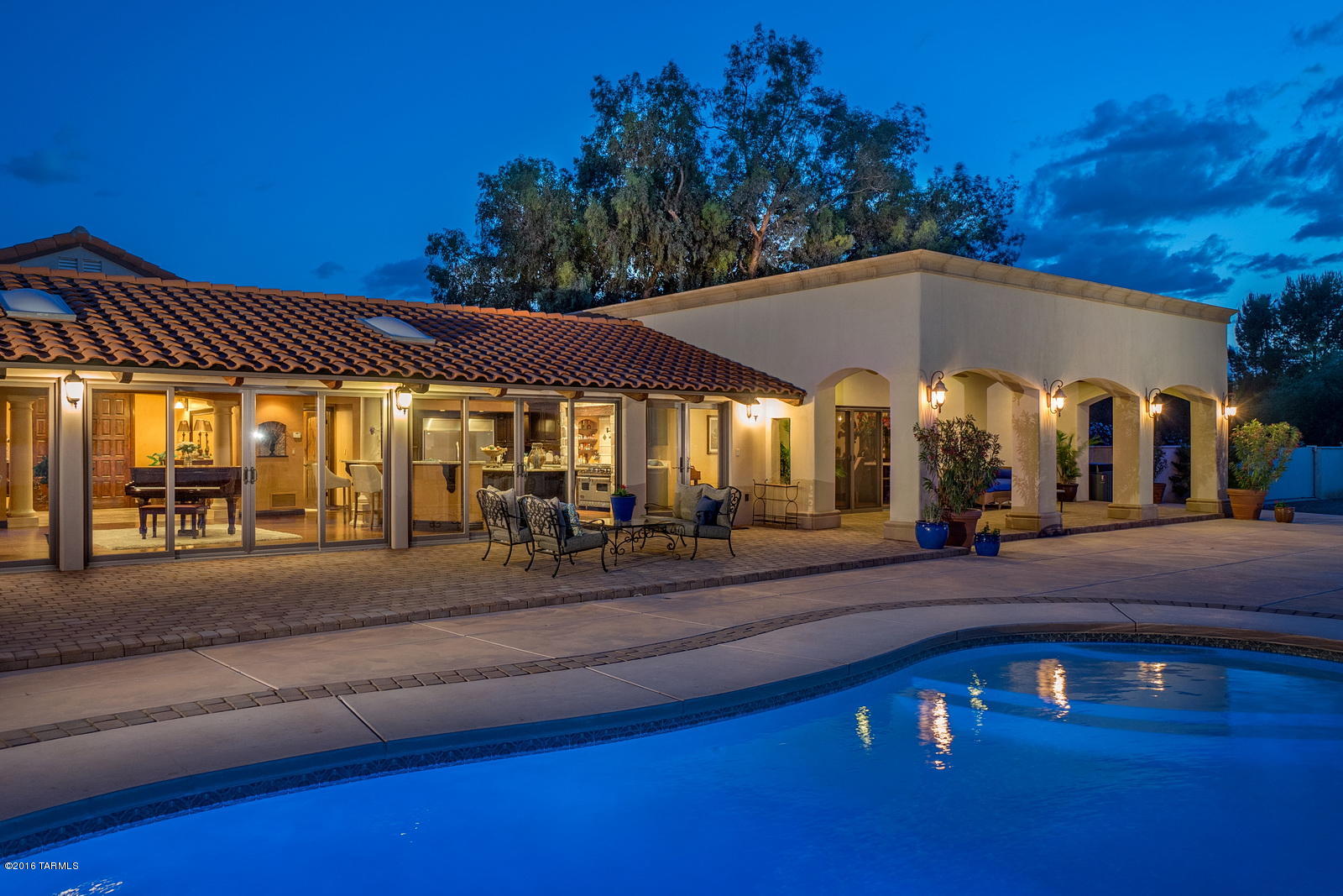 Impressive Estate on a Premium Cul-De-Sac 1.13 acre lot in the well sought after Tucson Country Club. The backyard is an entertainer’s dream w/ Mtn views & features an outdoor kitchen complete w/ a dishwasher, fridge, BBQ w/ side burner, ice maker & chest. Enjoy the sparkling pool w/ LED lighting, expansive covered patio, & fire pit. Inside no detail was spared. The gourmet kitchen was designed for a true chef w/ a viking range, custom, self-closing cabinetry, granite counters, & a wine fridge. The spacious master retreat showcases his & her closets, marble flooring & shower, and plenty of custom cabinetry. Enjoy the media room & an impeccable work out room. An additional luxurious appointment includes a central audio system throughout. 4 car plus golf cart garage w/ epoxy floors & stora
