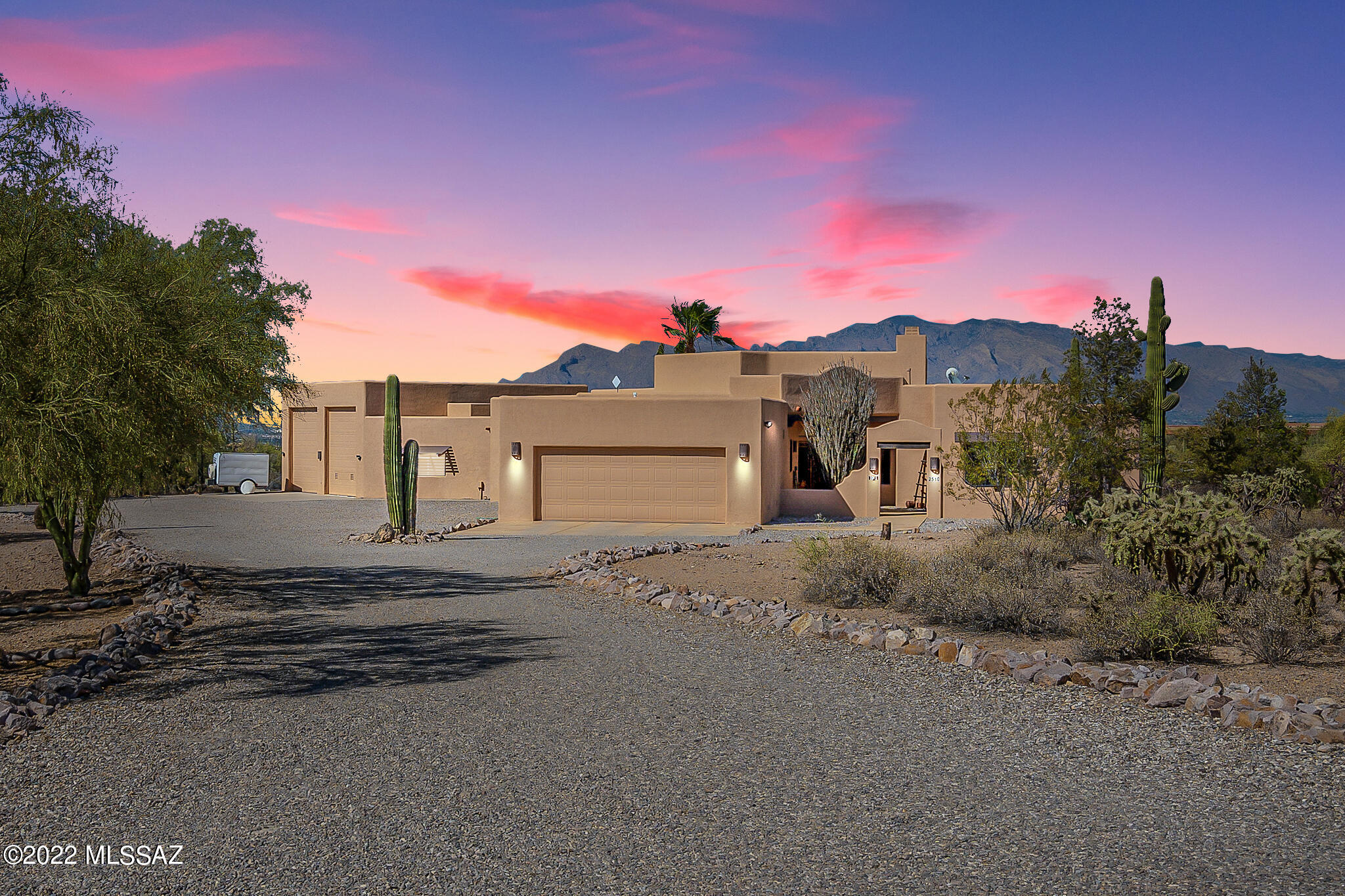 One of the FINEST HOMES in the SOUTHWEST!!  This home shows a tremendous Pride of Ownership!!!  Home sits on 3.3 of usable acreage with GLORIOUS Mountain and City VIEWS, and views of the Sonoran Desert. This property is near the Tucson Metro area, UofA, and I-10.  This home features 4 bedrooms, 3 bathrooms,  an open floor-plan, pool/spa, 2 oversized car-garage, 2 enclosed RV garages, 1 of the RV garages has been converted into a guest house. NO HOA!!  Please take a look at documents for all the extra features this home has to offer. Just too many to list!!